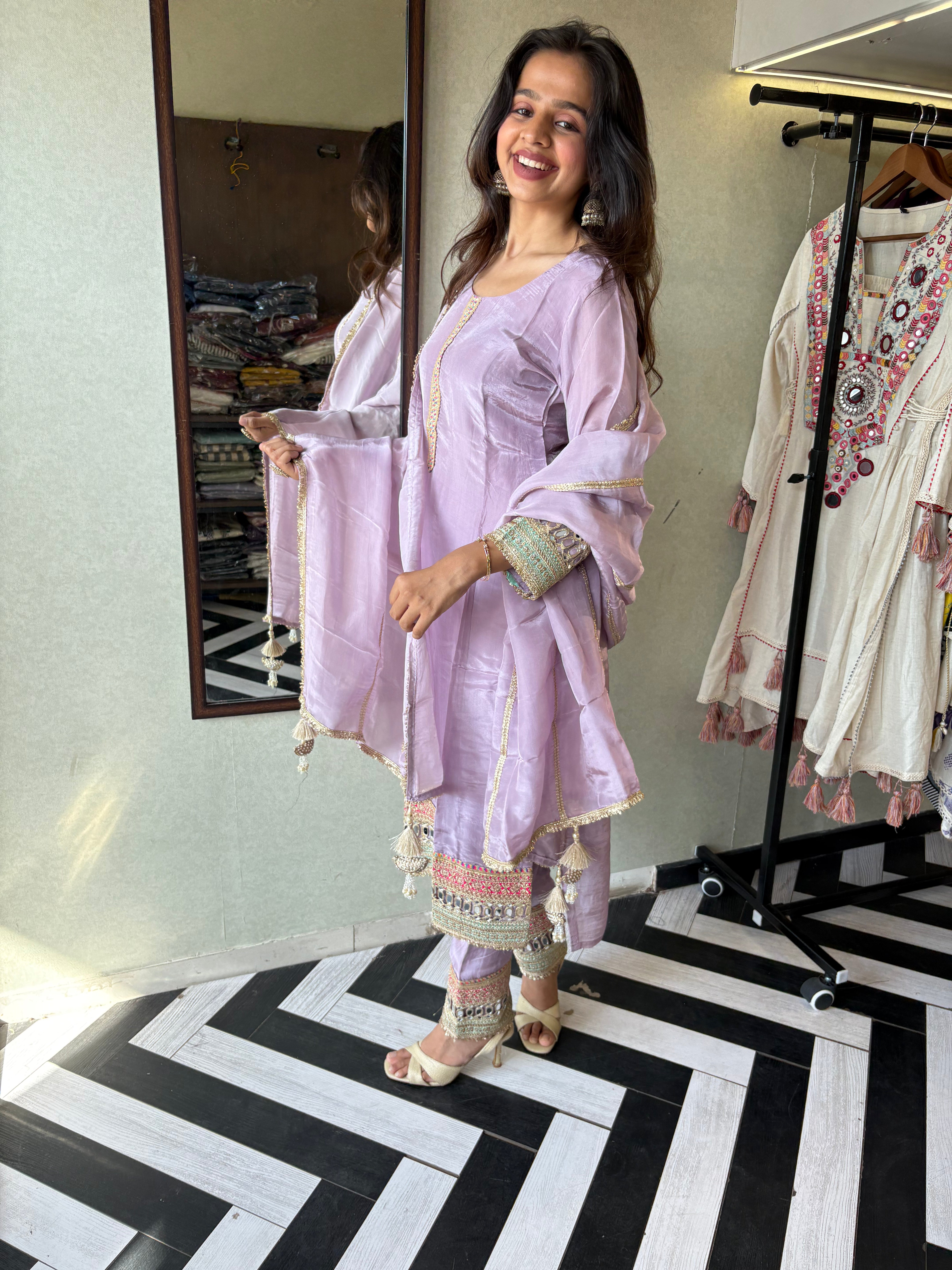 Shine Bright in Royal Magenta!

Crafted in pure silk crepe, this designer straight-cut kurti set is finished with mirror handwork on sleeves and pant ends - a perfect blend of subtle glam and timeless class.