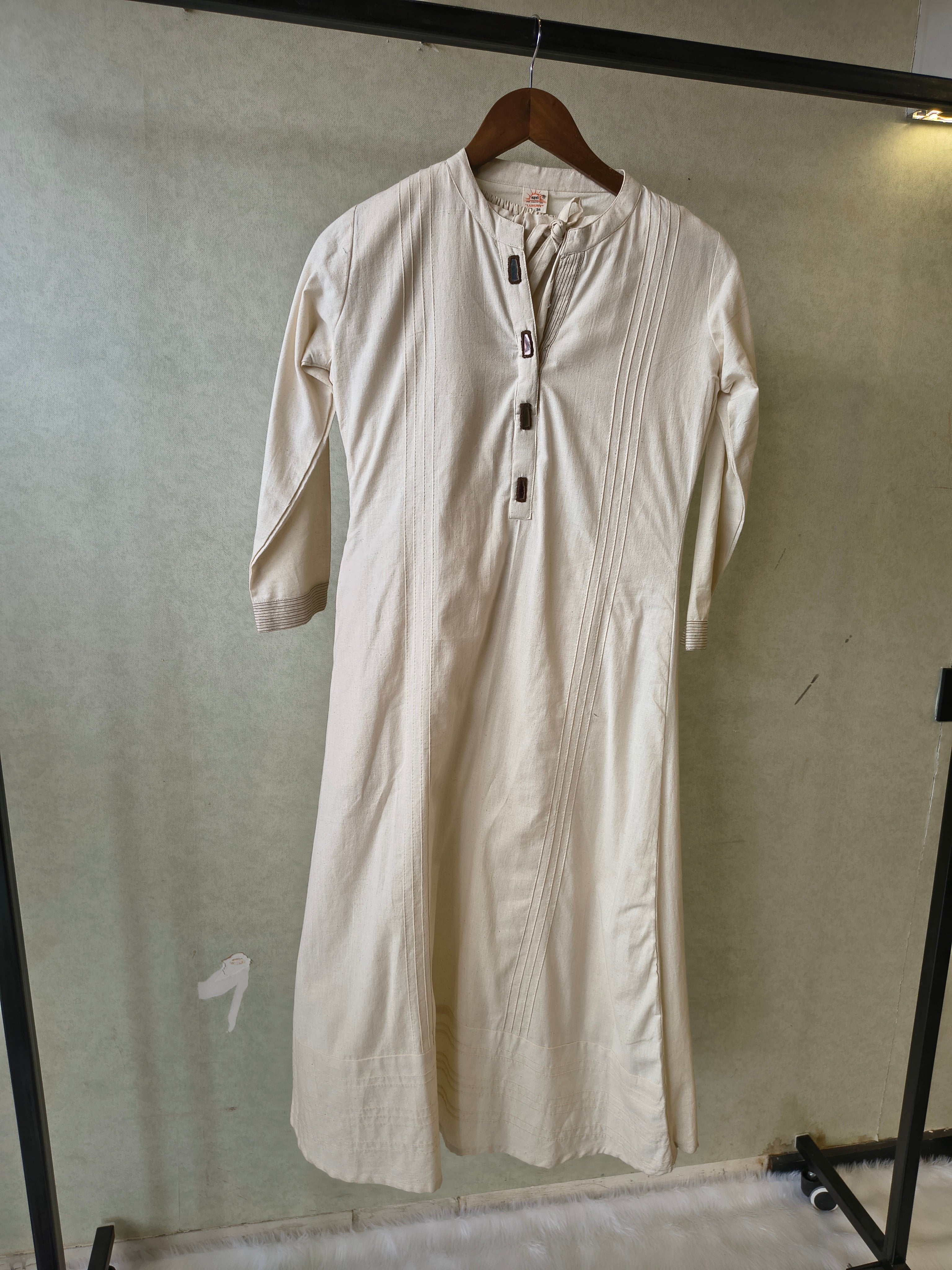 Image of Premium Off-White Cotton A-Line Kurta & Pant Co-Ord Set with Pintuck Detailing