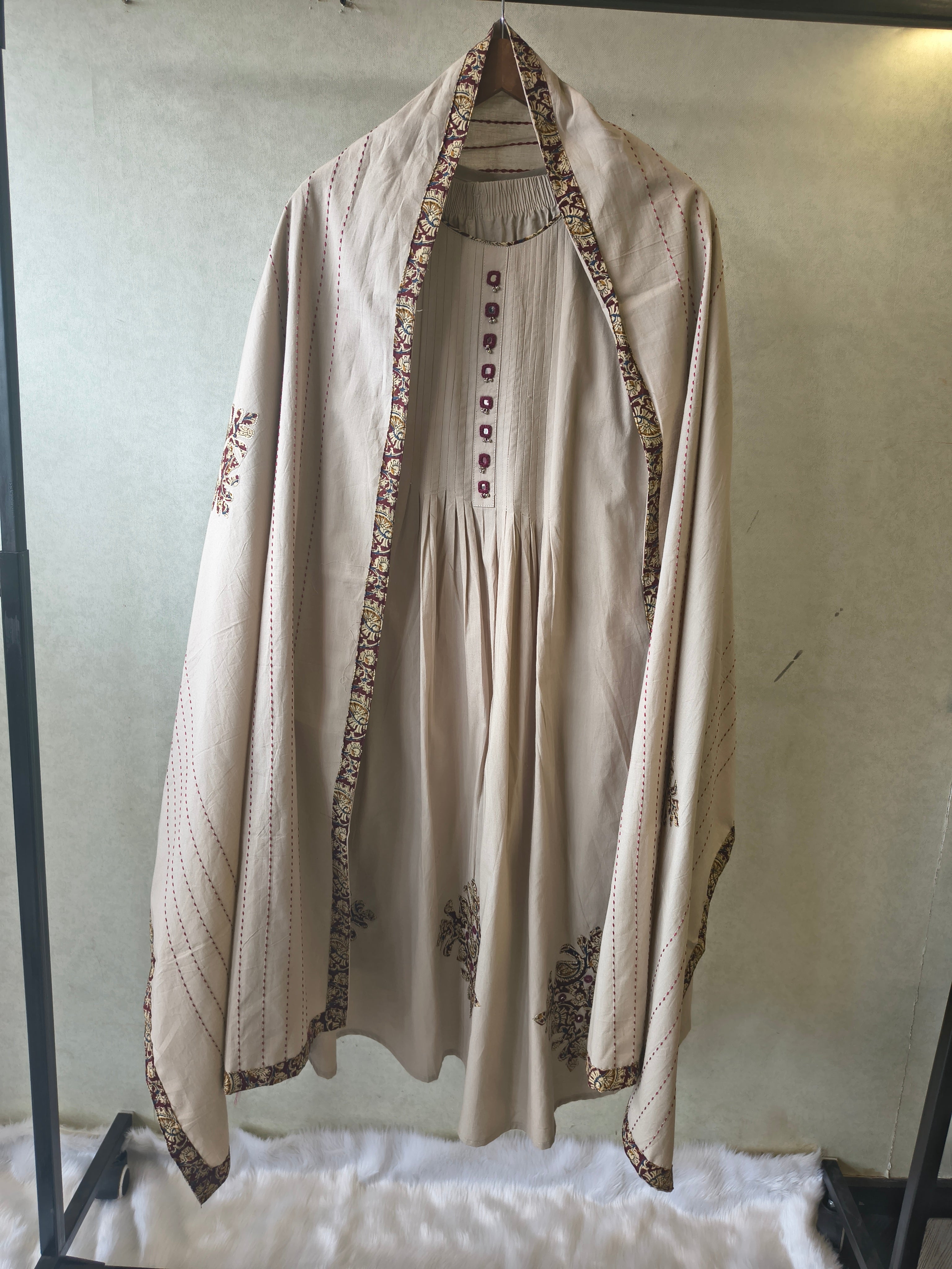 Image of Beige Embroidered Three-Piece Kurta Set with Pintuck Detailing & Designer Dupatta