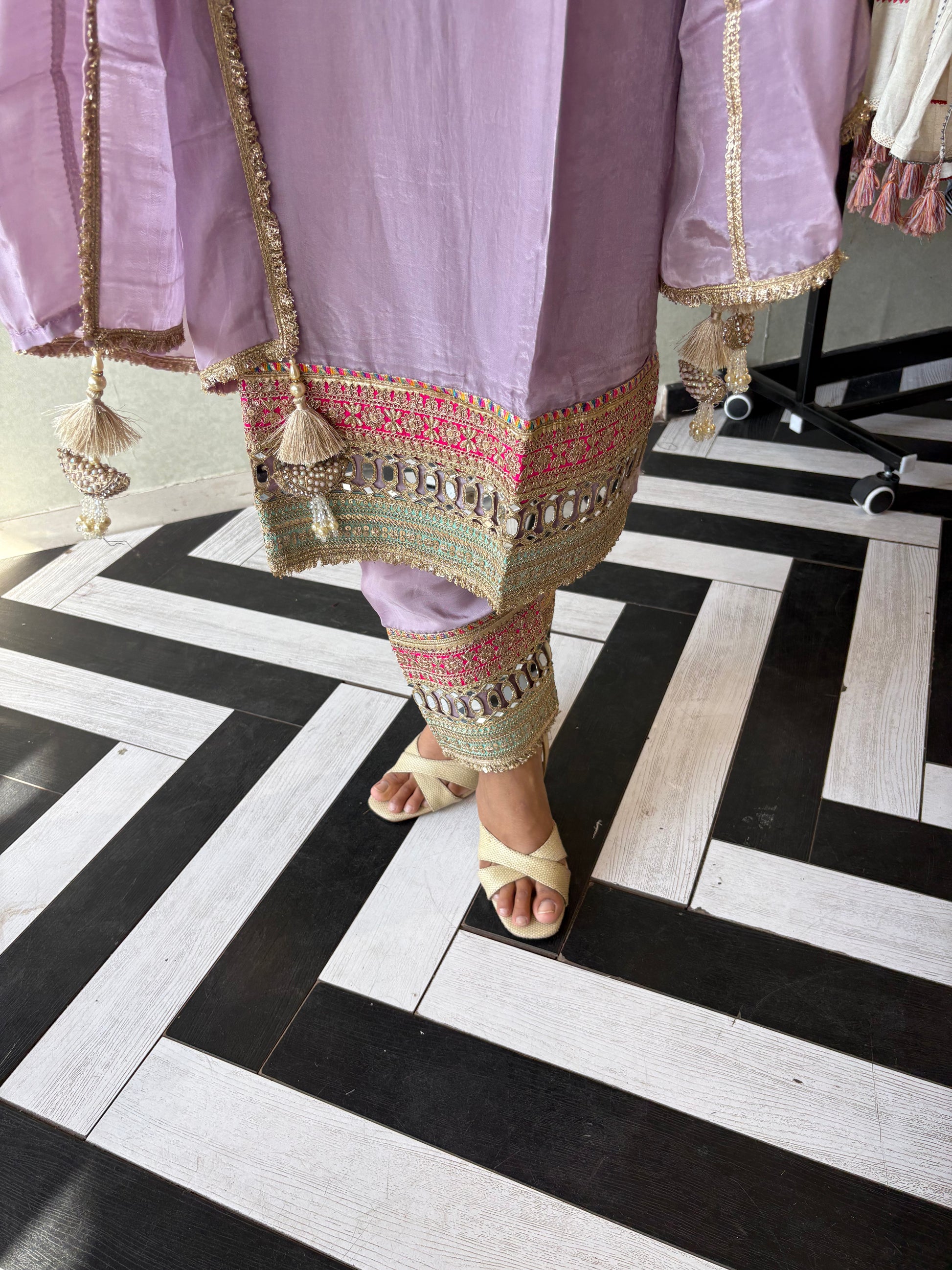 Shine Bright in Royal Magenta!

Crafted in pure silk crepe, this designer straight-cut kurti set is finished with mirror handwork on sleeves and pant ends - a perfect blend of subtle glam and timeless class.