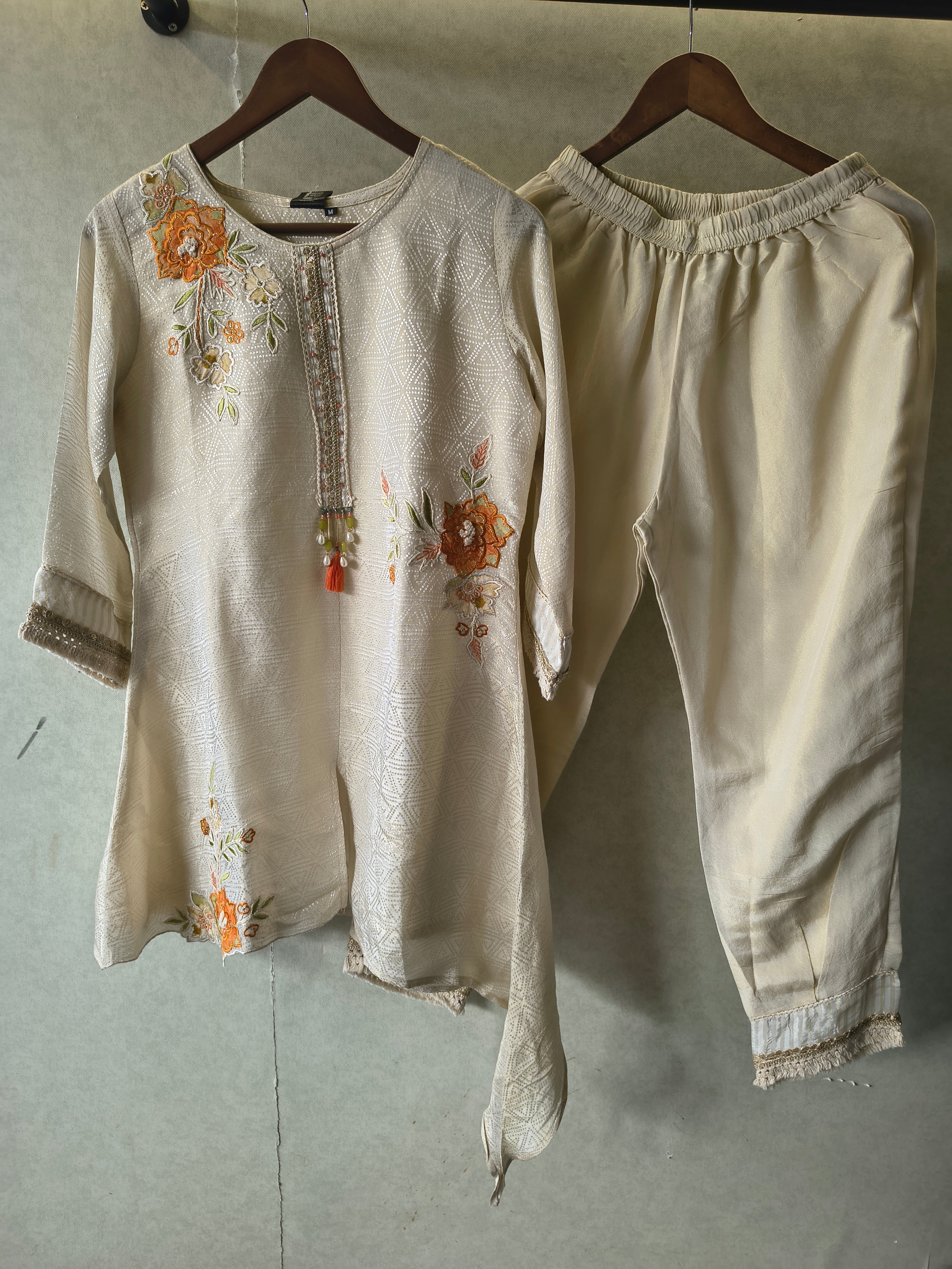 Image of Ivory Floral Embroidered Premium Asymmetrical Kurta Pant Co-Ord Set