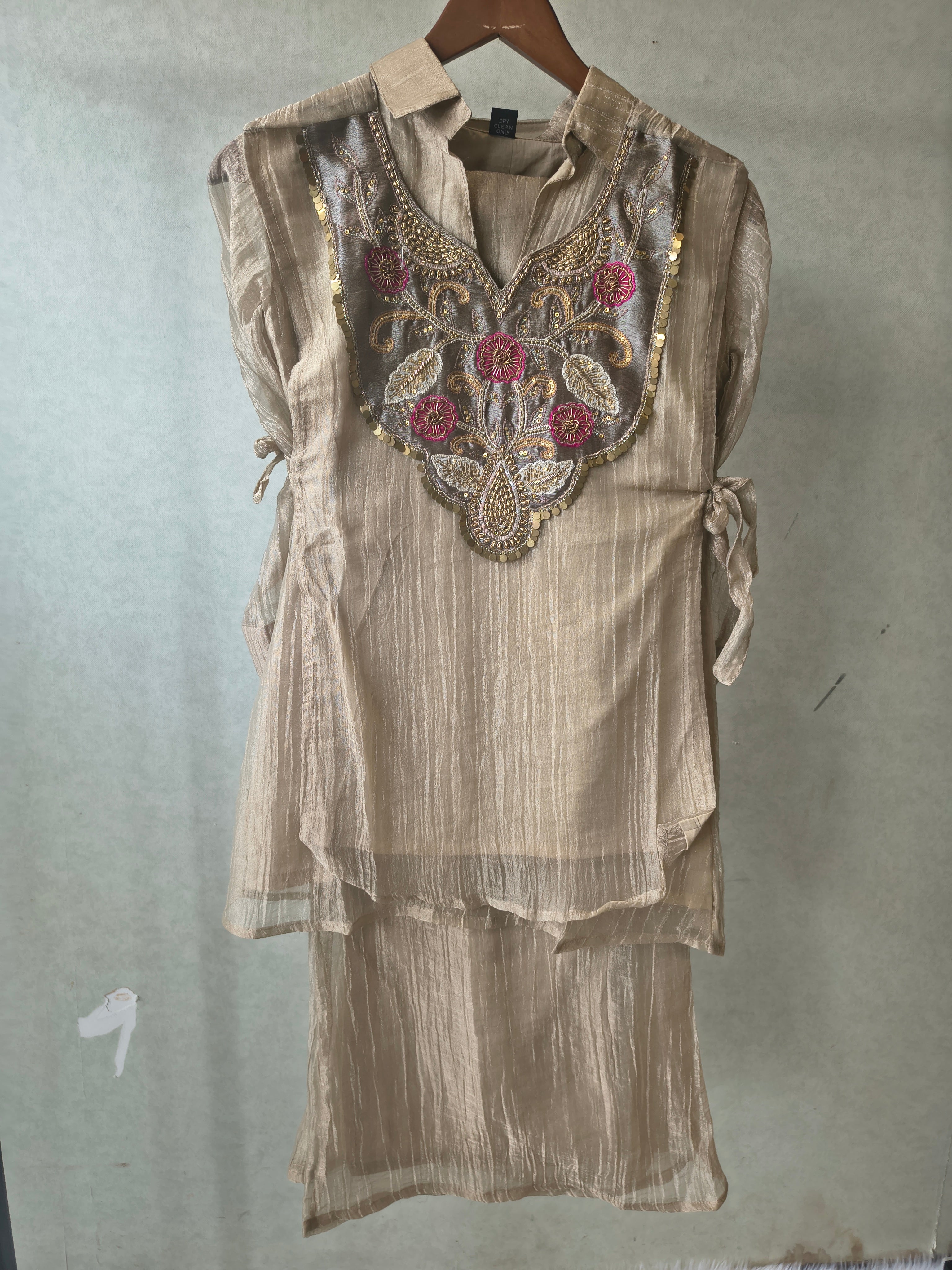 Image of Premium Champagne Tissue Silk Embroidered Kurta with Hand Embellished Statement Yoke