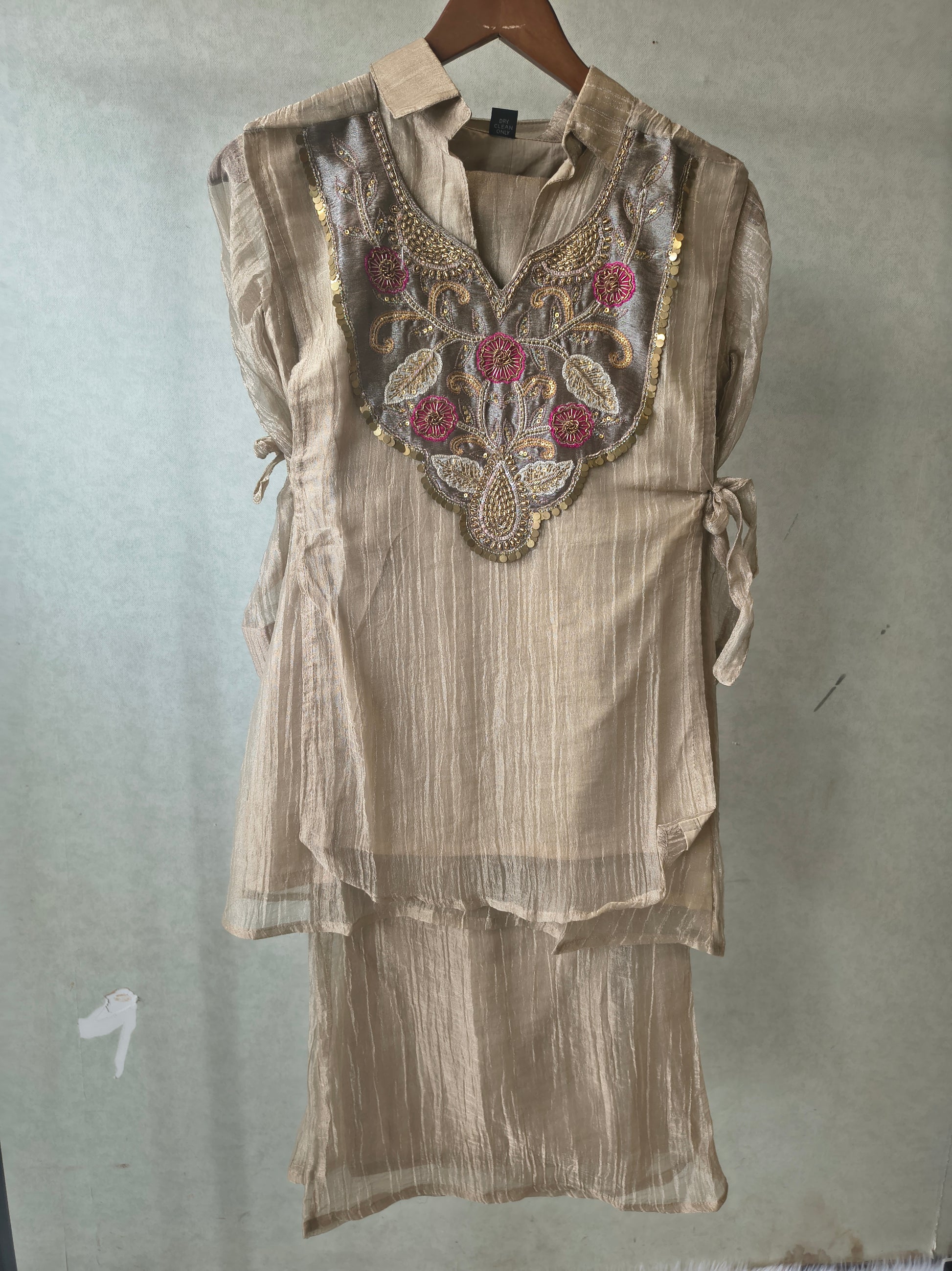 Premium Champagne Tissue Silk Embroidered Kurta with Hand Embellished Statement Yoke