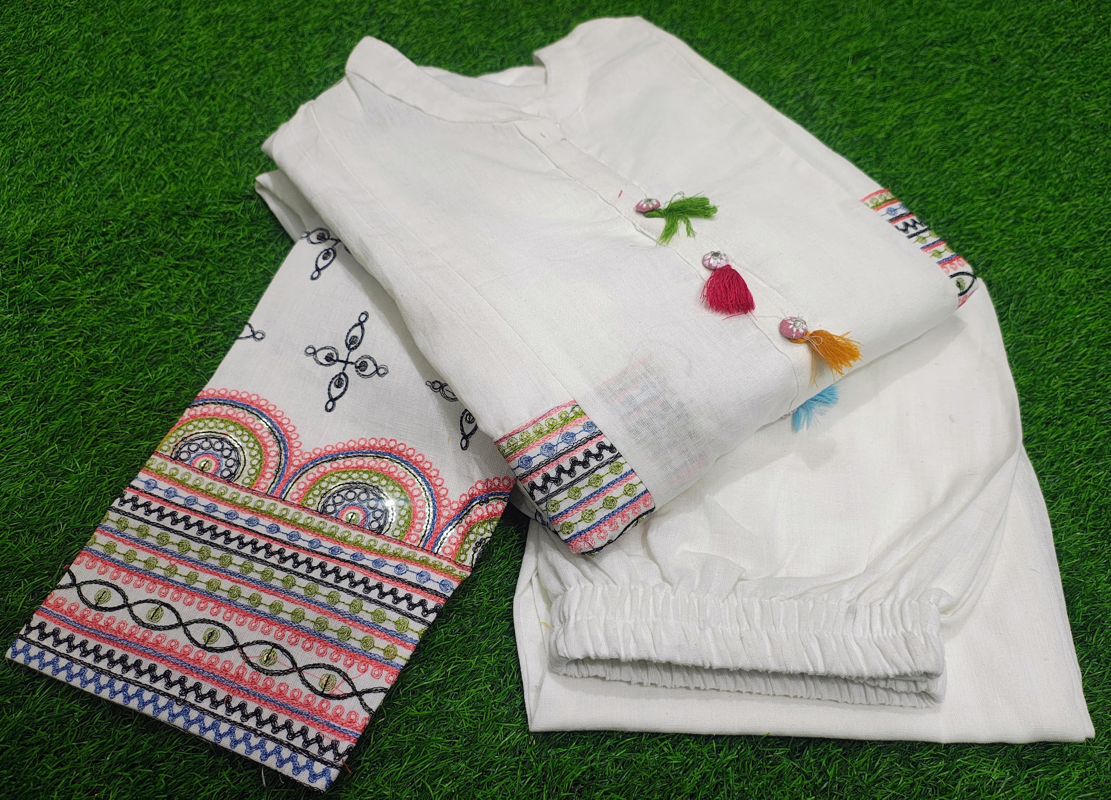 Aline kurta Style made from high-quality cotton flex, embellished with sequance embroidery work on hand sleeves and side line and paired with matching pant.