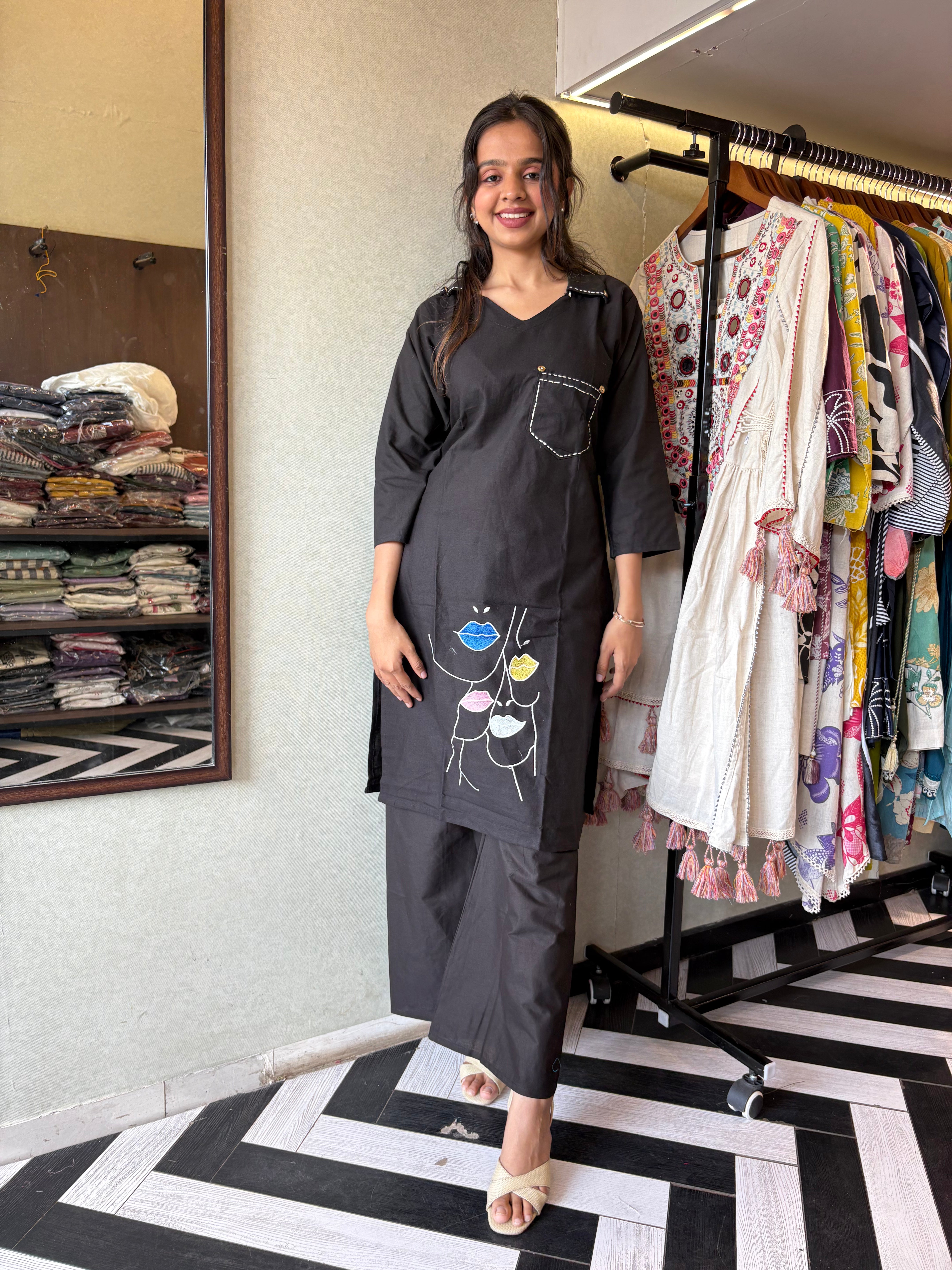 Image of pure cotton black co-ord set, elevated with elegant embroidery detailing. It's a wardrobe must-have that looks premium