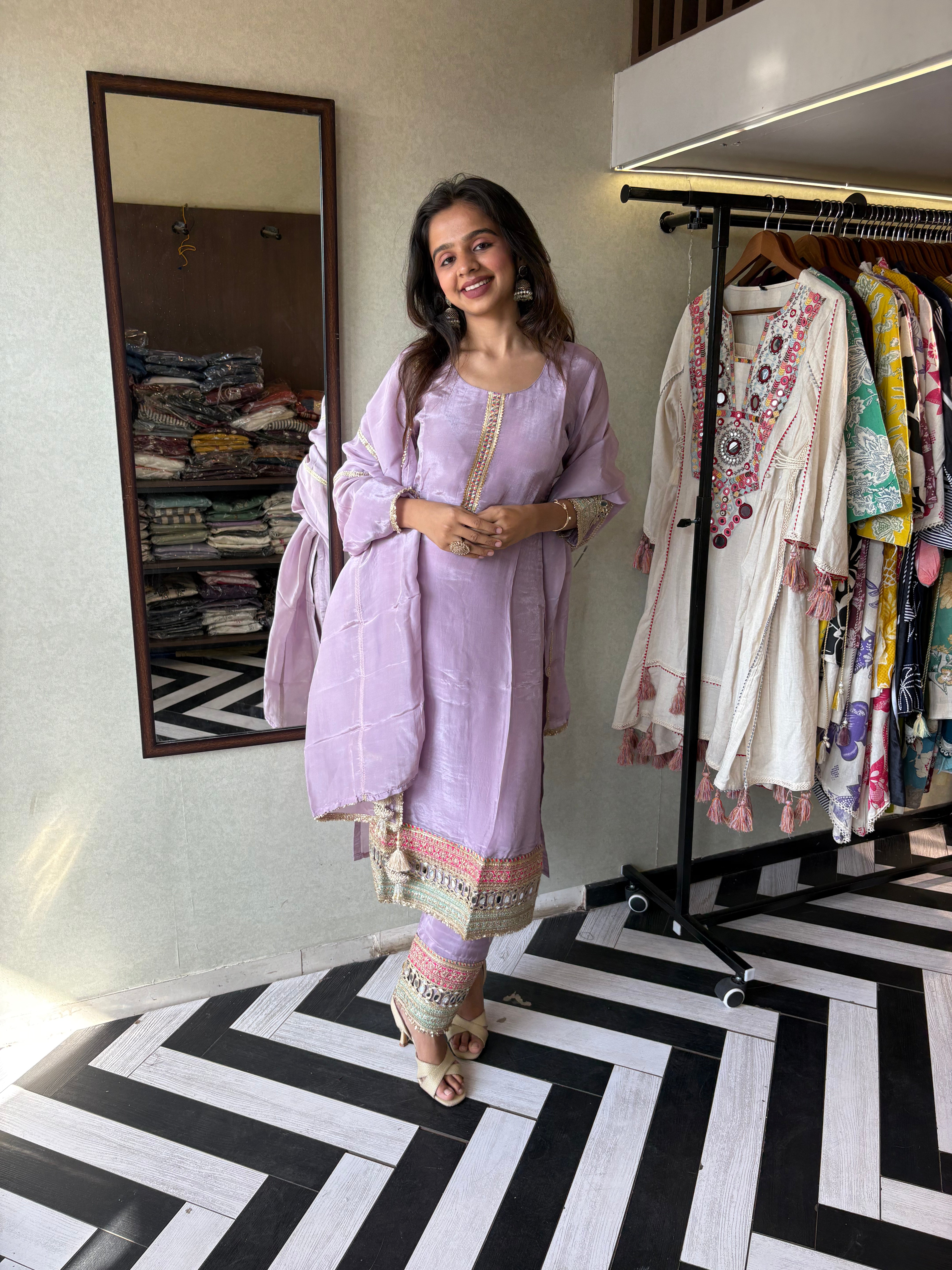 Image of Shine Bright in Royal Magenta!

Crafted in pure silk crepe, this designer straight-cut kurti set is finished with mirror handwork on sleeves and pant ends - a perfect blend of subtle glam and timeless class.