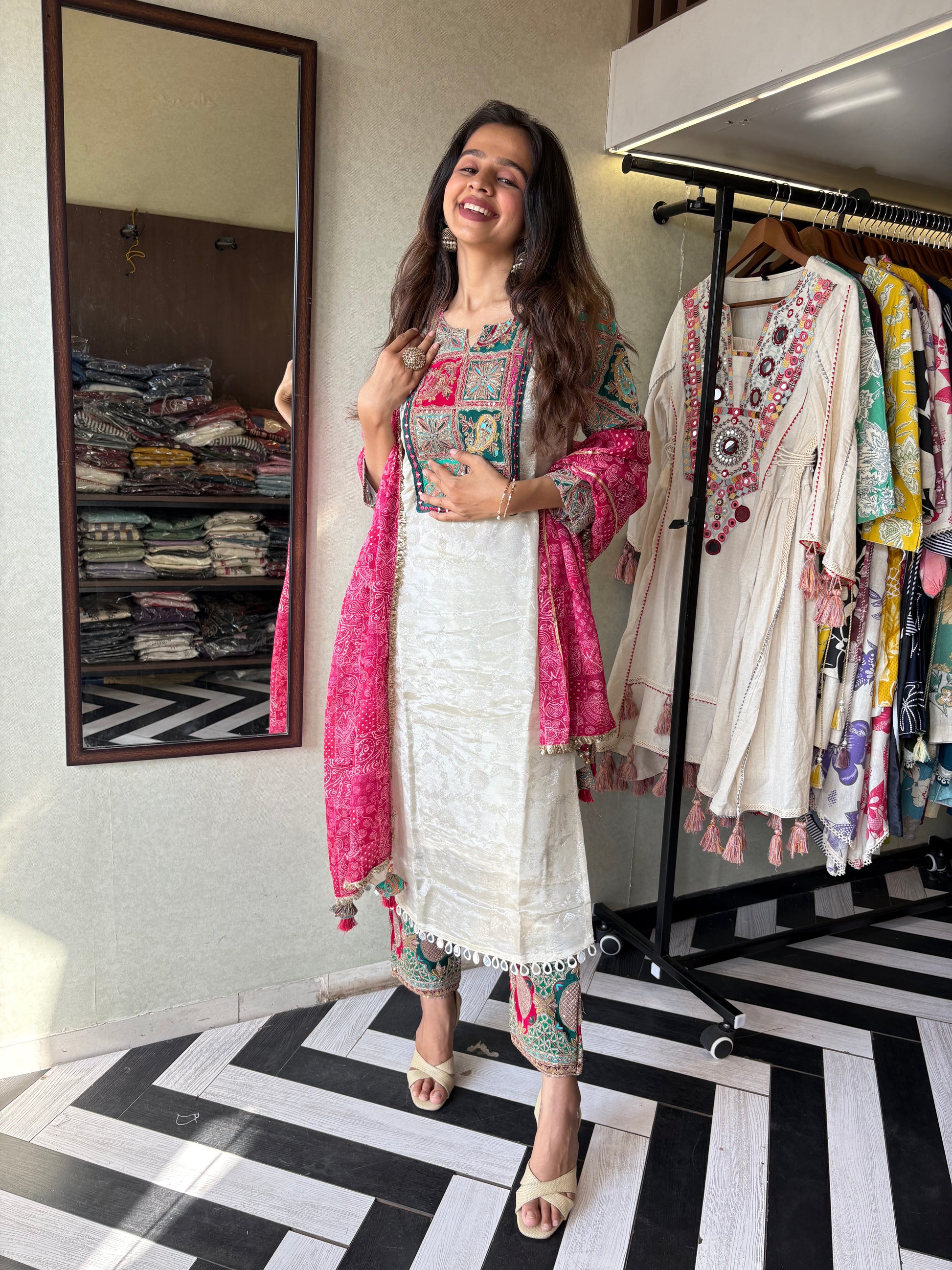 This pure cotton co-ord set in a designer white print is your summer savior - soft on the skin, bold on fashion