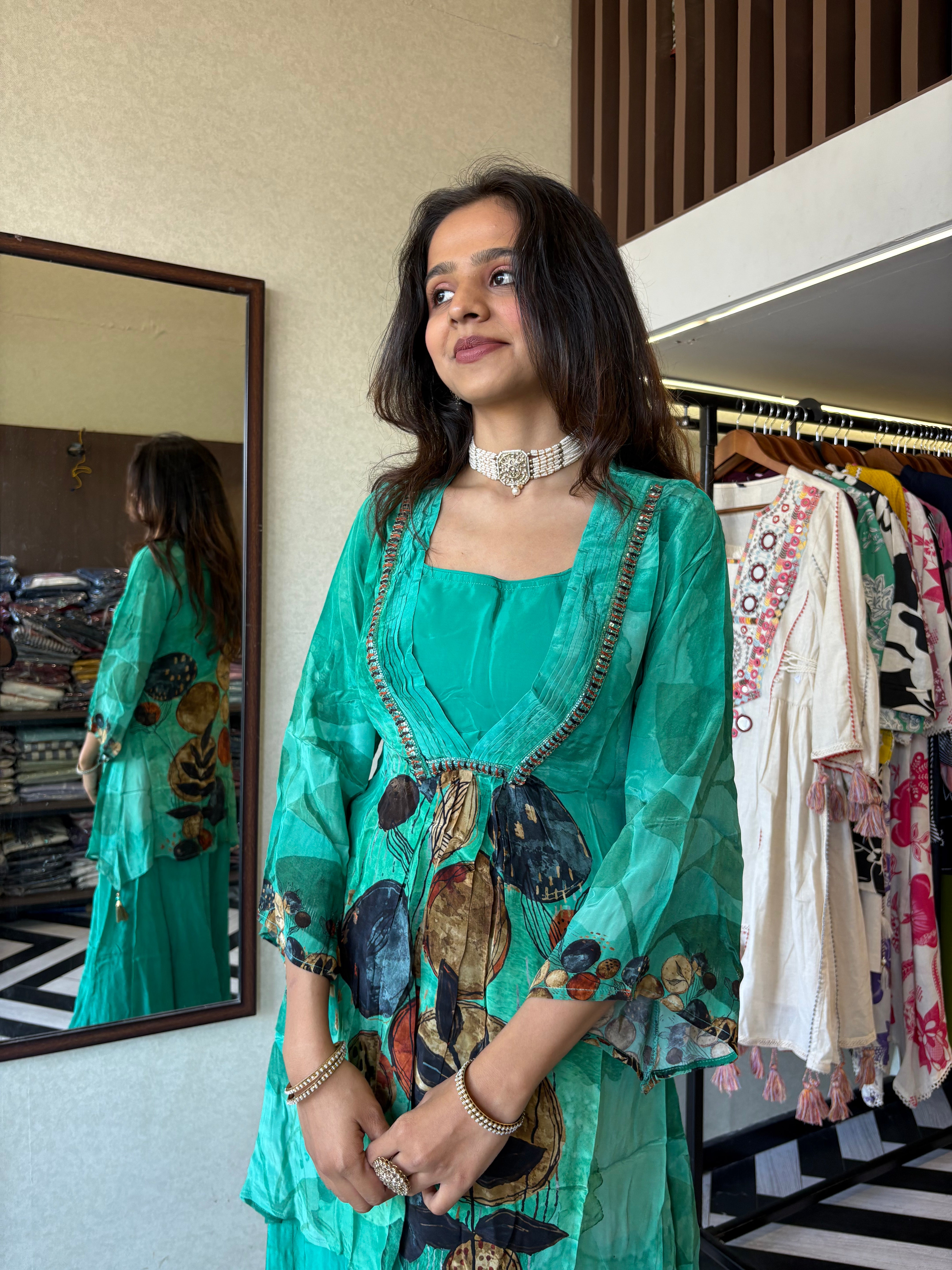 Step into the celebration with our Designer Crepe 2-Piece Set in a refreshing green hue, crafted with intricate detailing and effortless grace