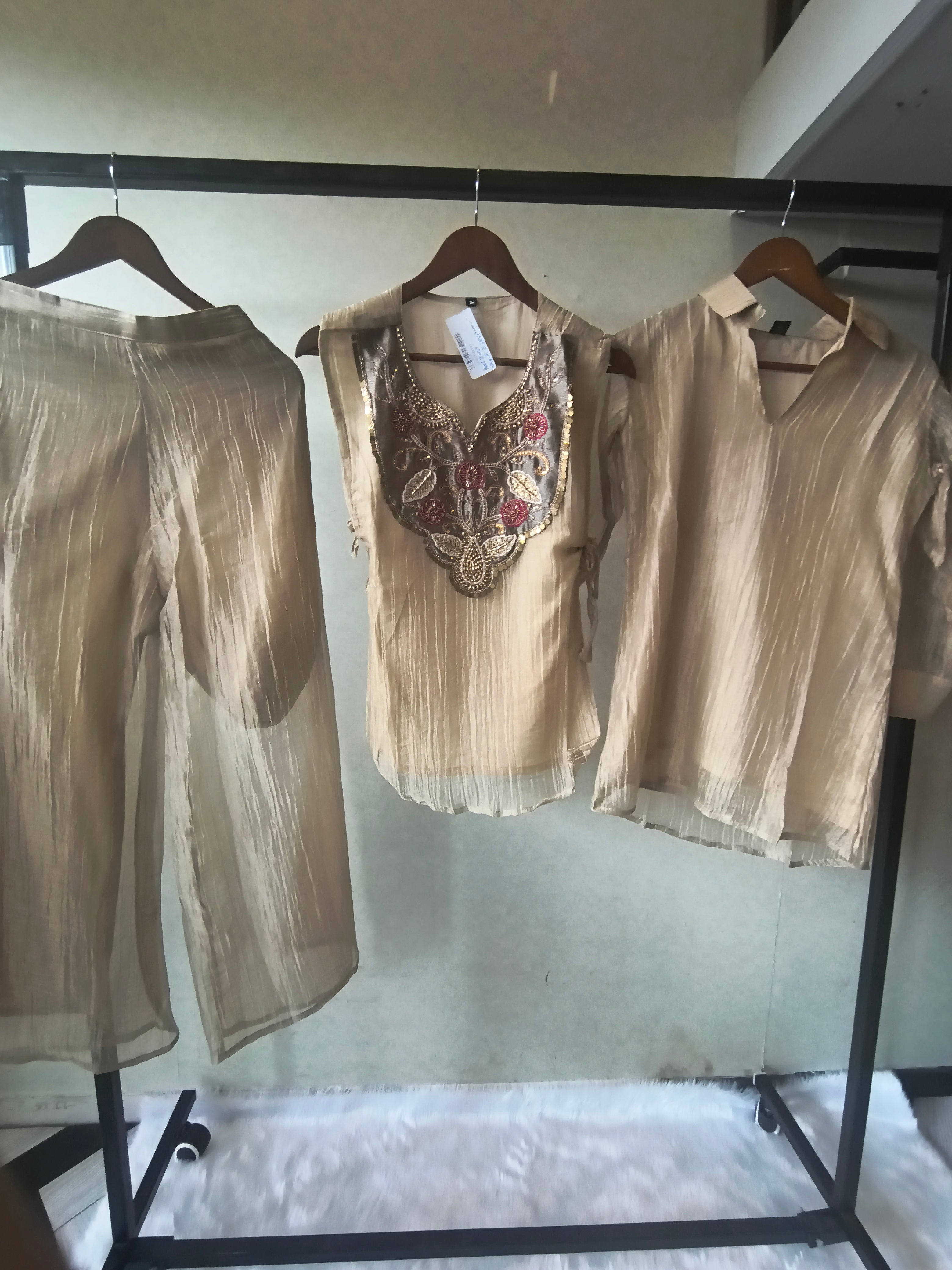 Image of Premium Champagne Tissue Silk Embroidered Kurta with Hand Embellished Statement Yoke