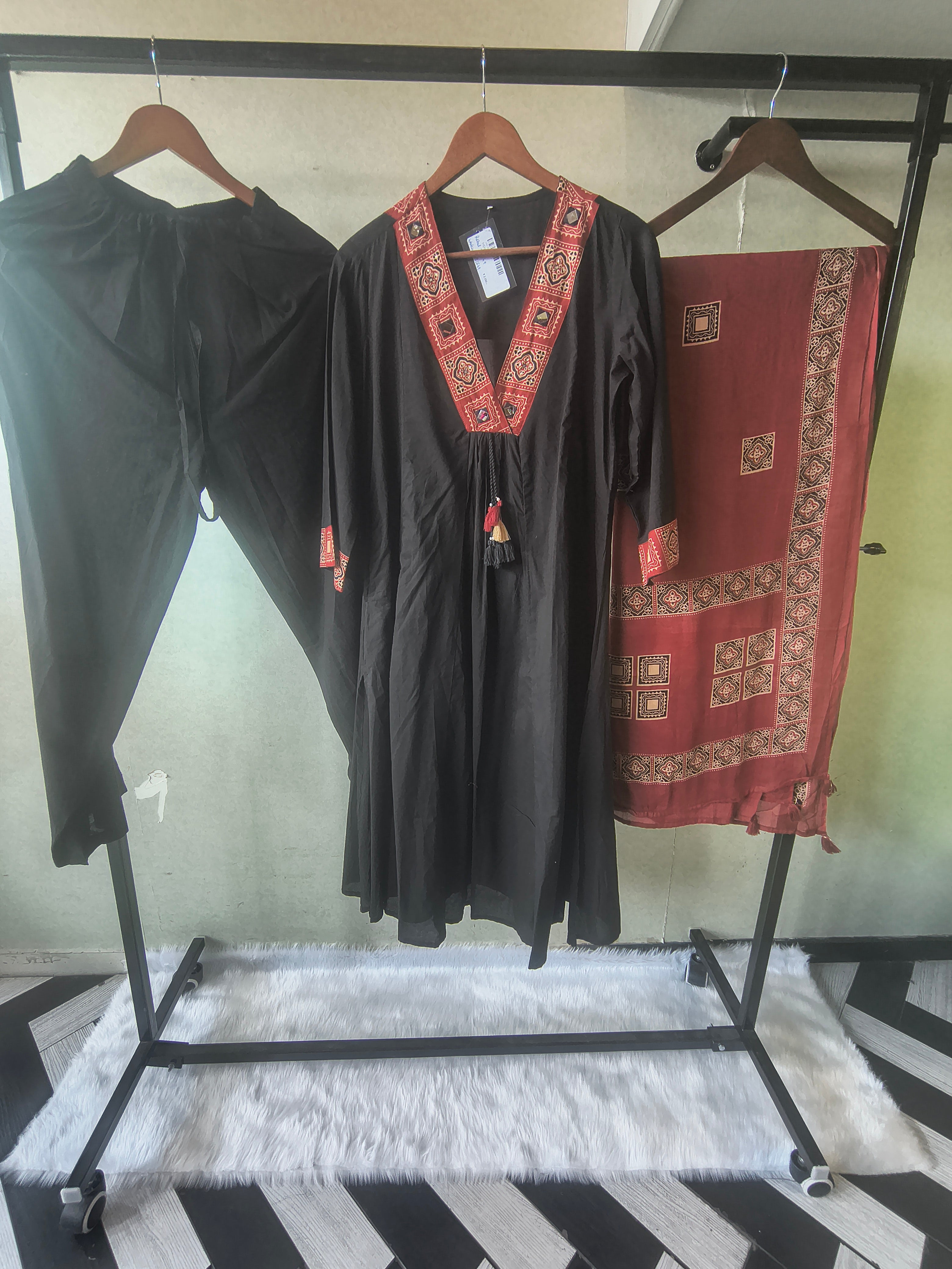 Image of Black Cotton Blend 3-Piece Suit Set with Tribal Printed V-Neck, Tassel Tie-Up & Printed Dupatta