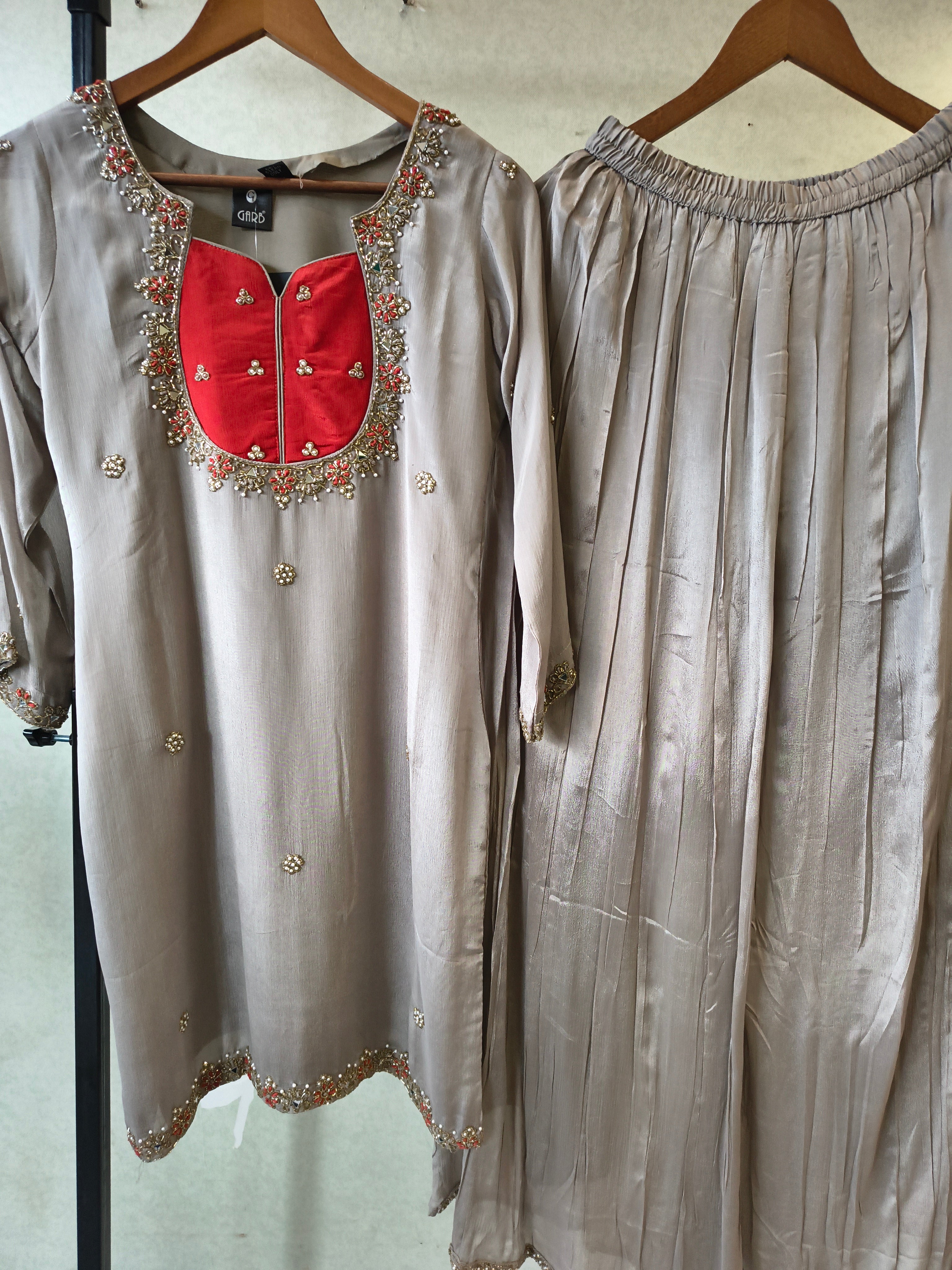 Image of Pearl Grey Embellished Straight Kurta Set with Handcrafted Neckline, Wide Palazzo & Chiffon Dupatta | Premium 3 Piece Festive Ensemble