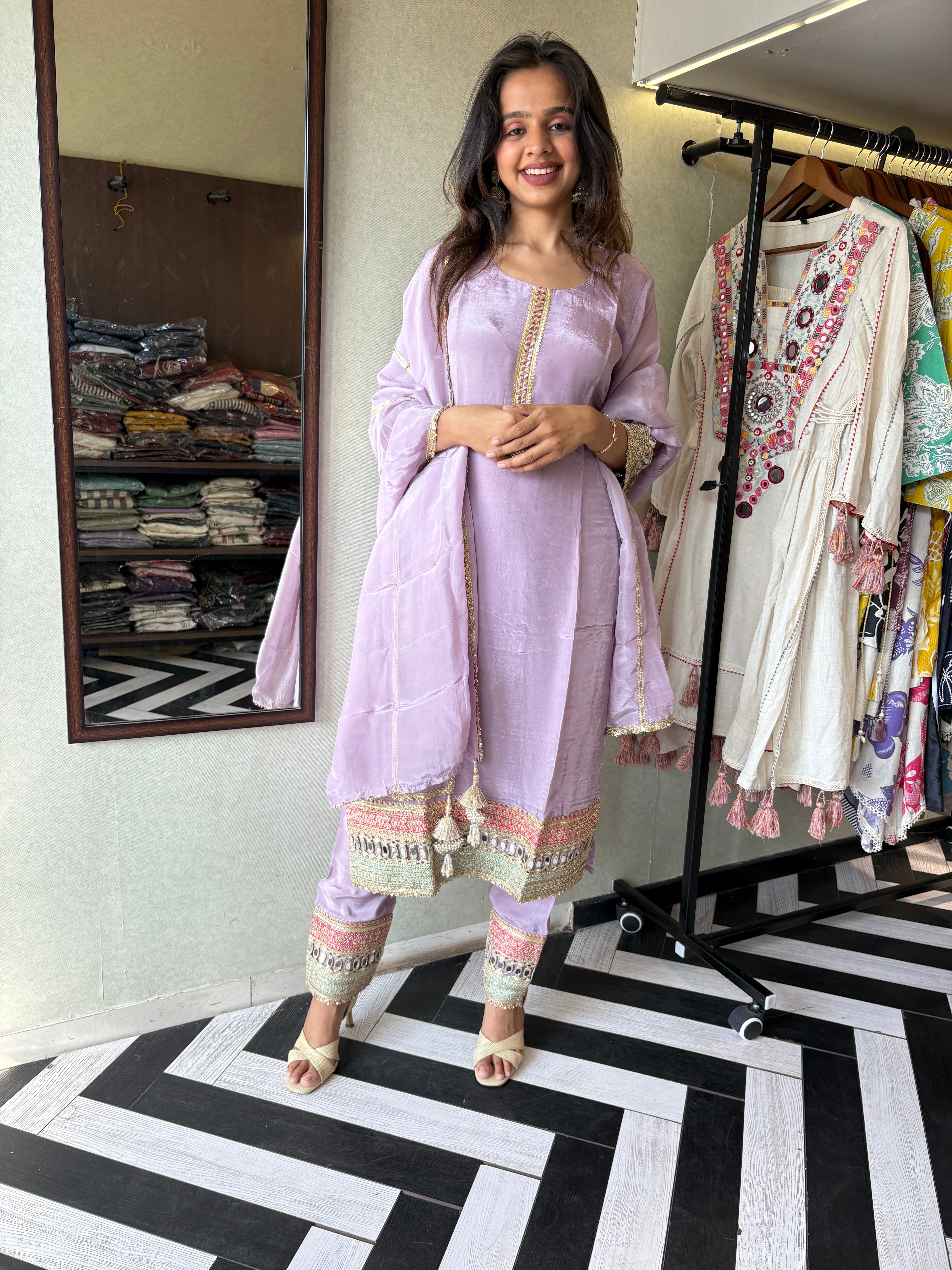 Shine Bright in Royal Magenta!

Crafted in pure silk crepe, this designer straight-cut kurti set is finished with mirror handwork on sleeves and pant ends - a perfect blend of subtle glam and timeless class.