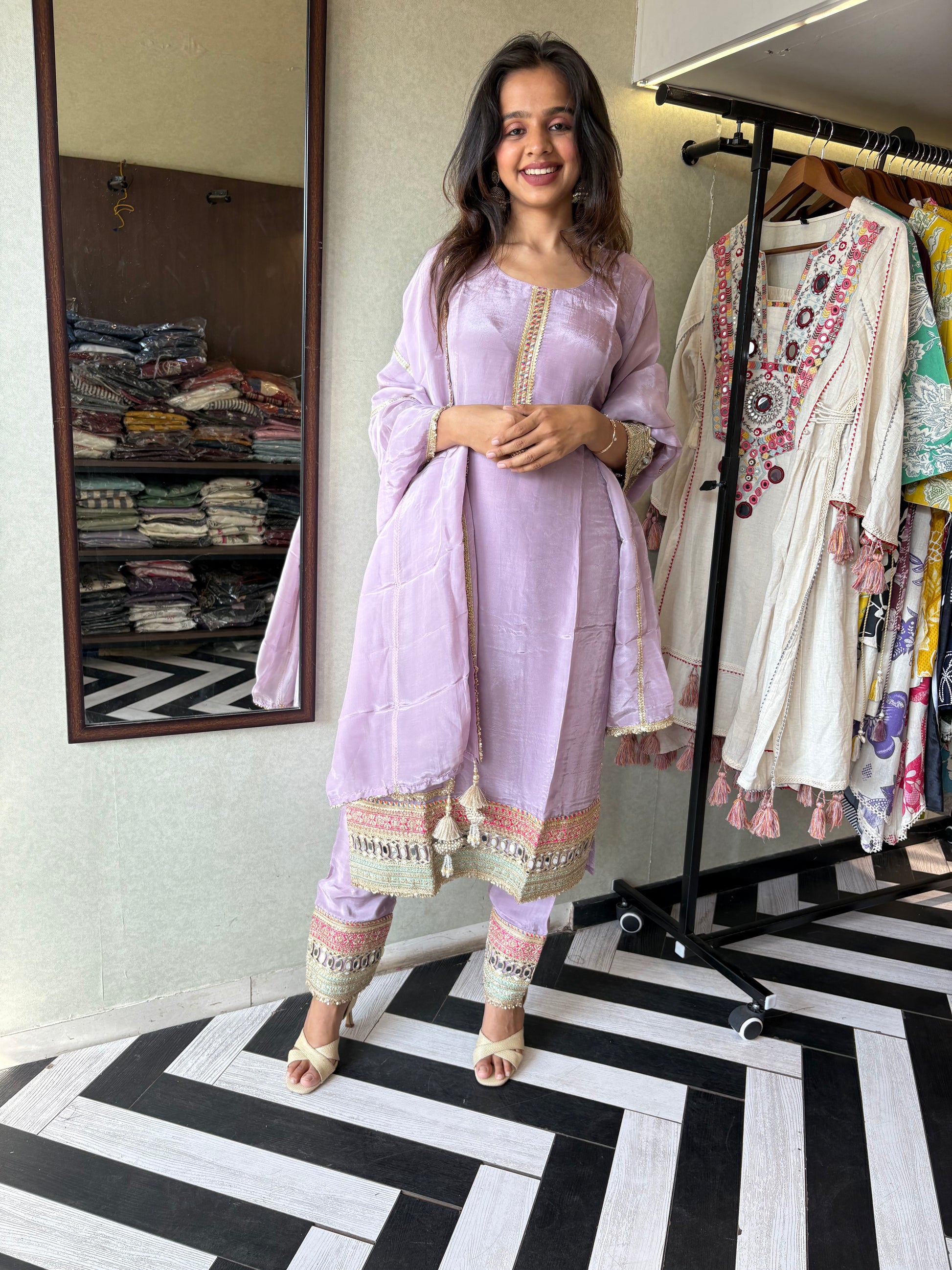 Shine Bright in Royal Magenta!

Crafted in pure silk crepe, this designer straight-cut kurti set is finished with mirror handwork on sleeves and pant ends - a perfect blend of subtle glam and timeless class.