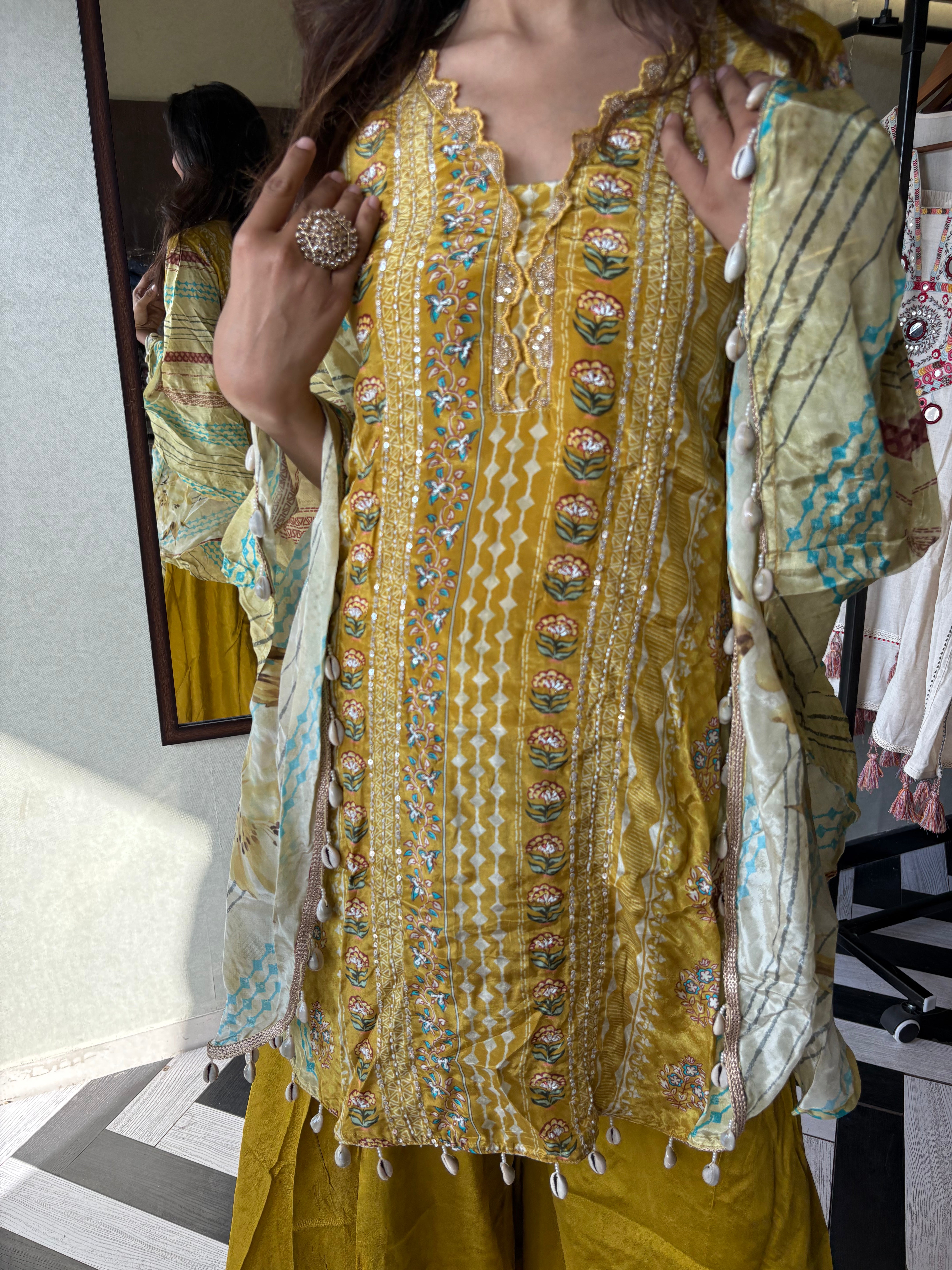 Crafted from pure crepe fabric with hand-sequenced accessory work - it's the sunshine outfit your wardrobe needs!