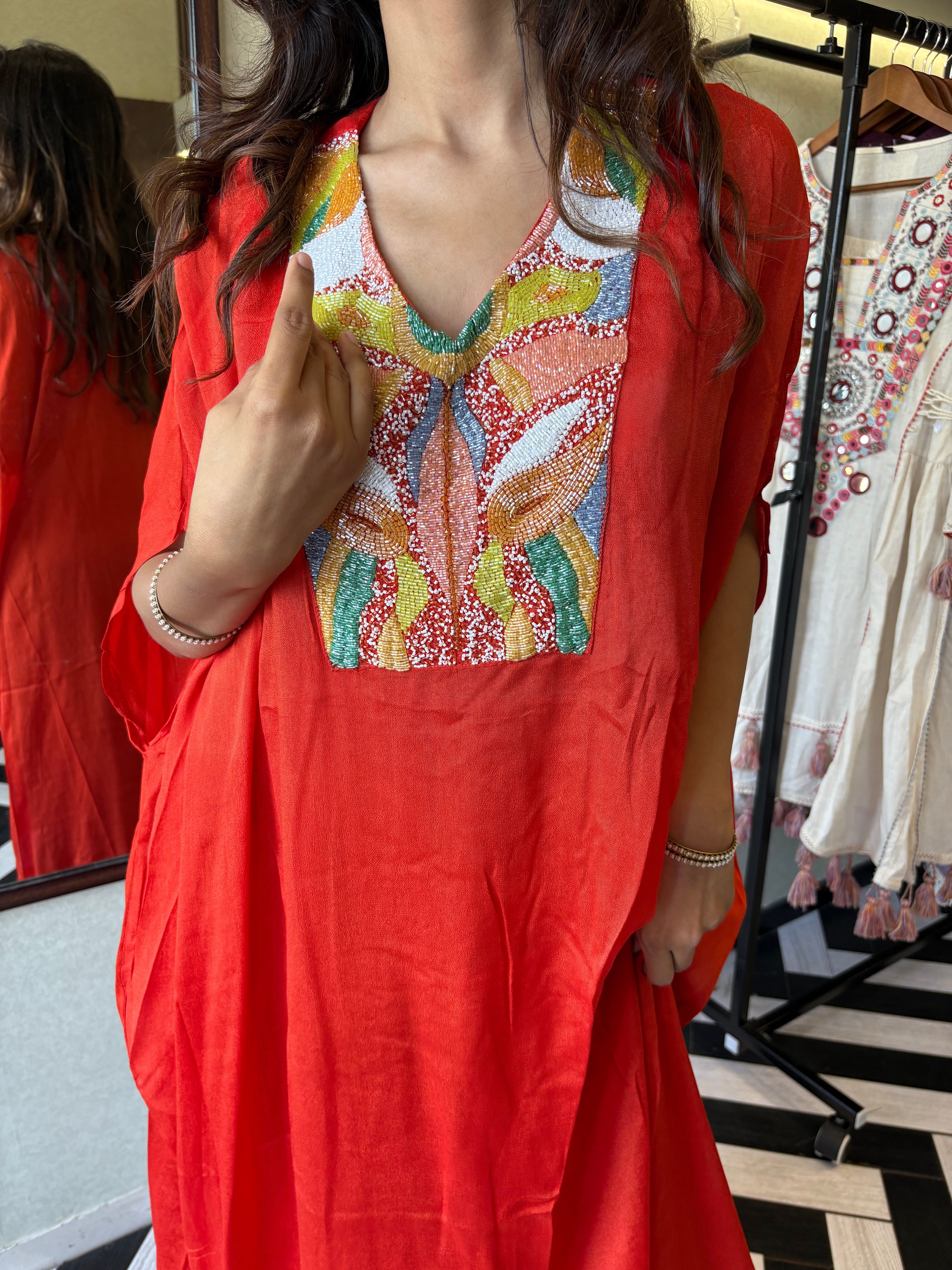 Image of Step into the spotlight in this premium 2-piece Indo-Western set in a breathtaking orange rust hue.