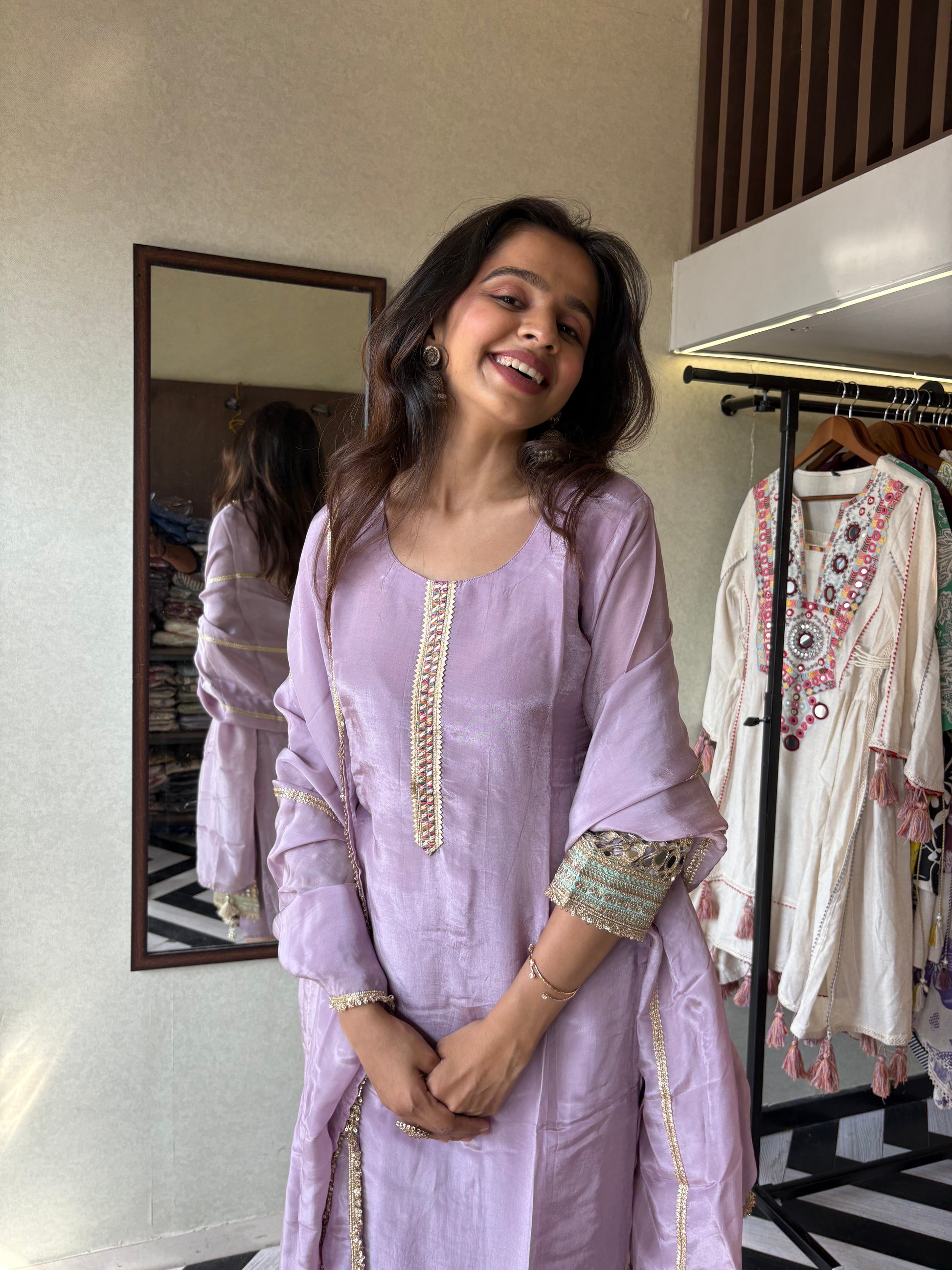 Shine Bright in Royal Magenta!

Crafted in pure silk crepe, this designer straight-cut kurti set is finished with mirror handwork on sleeves and pant ends - a perfect blend of subtle glam and timeless class.