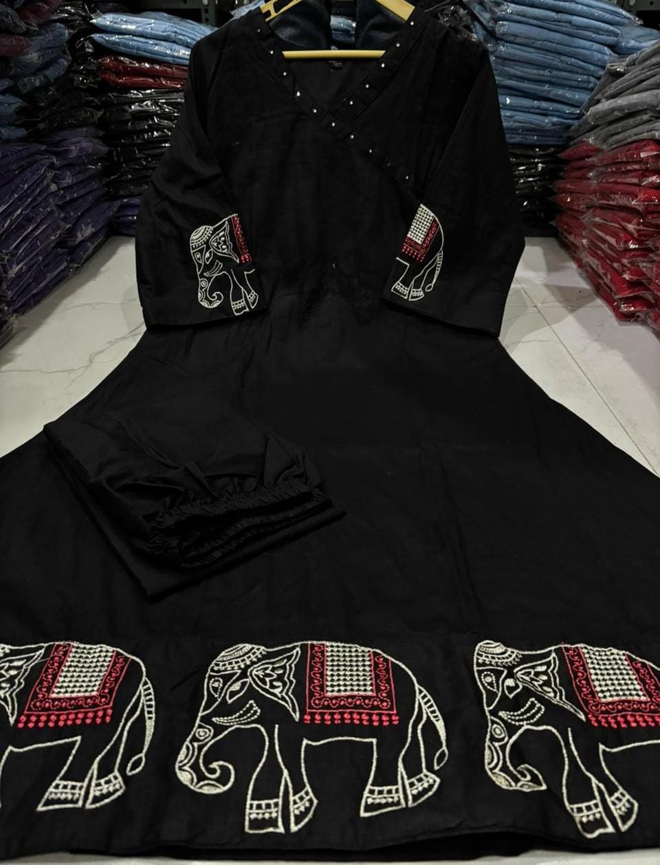 Upgrade your office wear wardrobe with this classy kurti embroidery work detailing with pant for all day comfort and trendy look