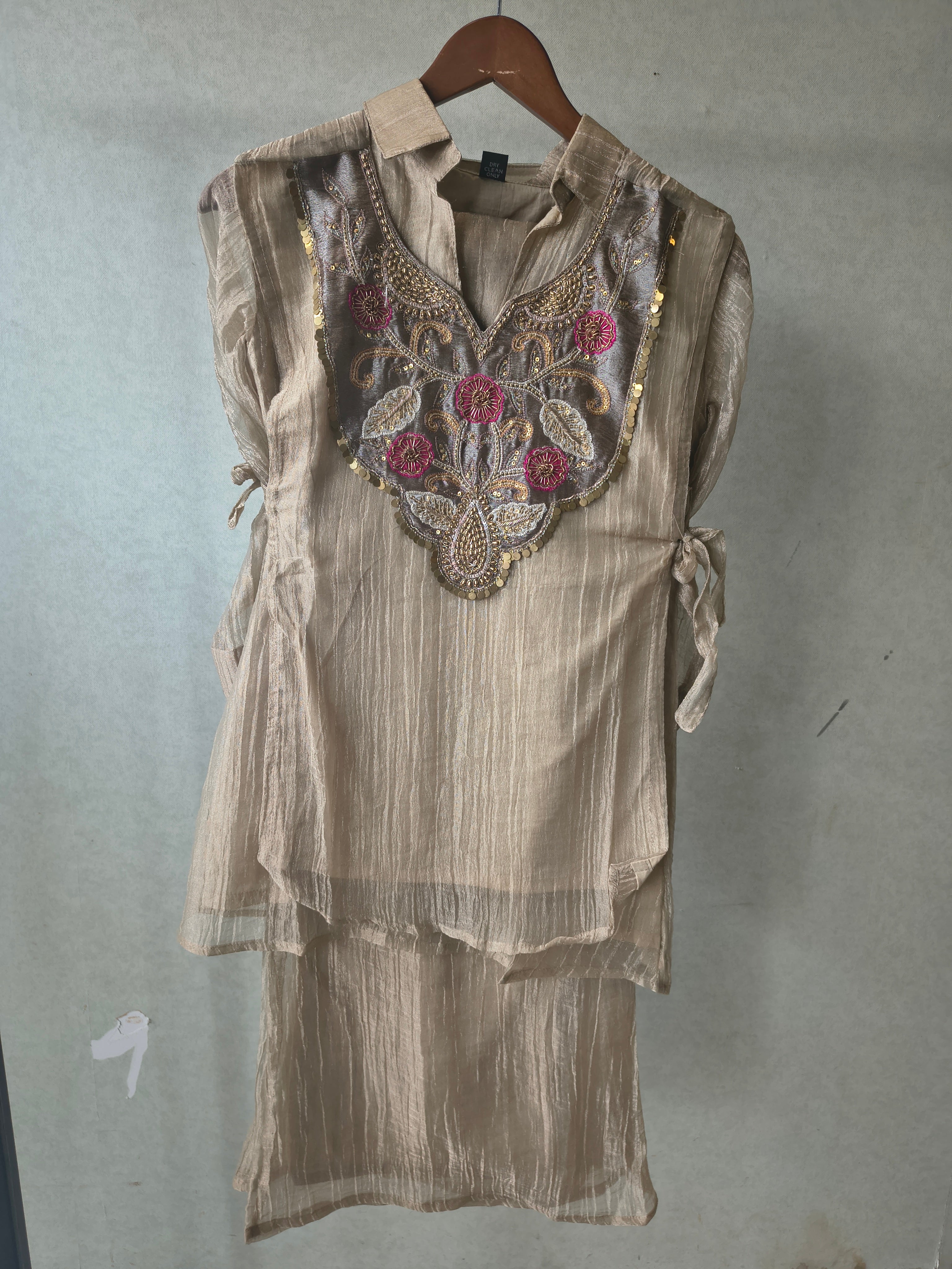 Image of Premium Champagne Tissue Silk Embroidered Kurta with Hand Embellished Statement Yoke