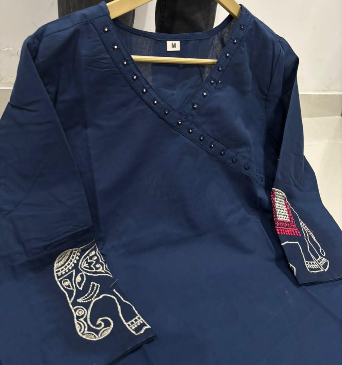 Image of Upgrade your office wear wardrobe with this classy kurti embroidery work detailing with pant for all day comfort and trendy look