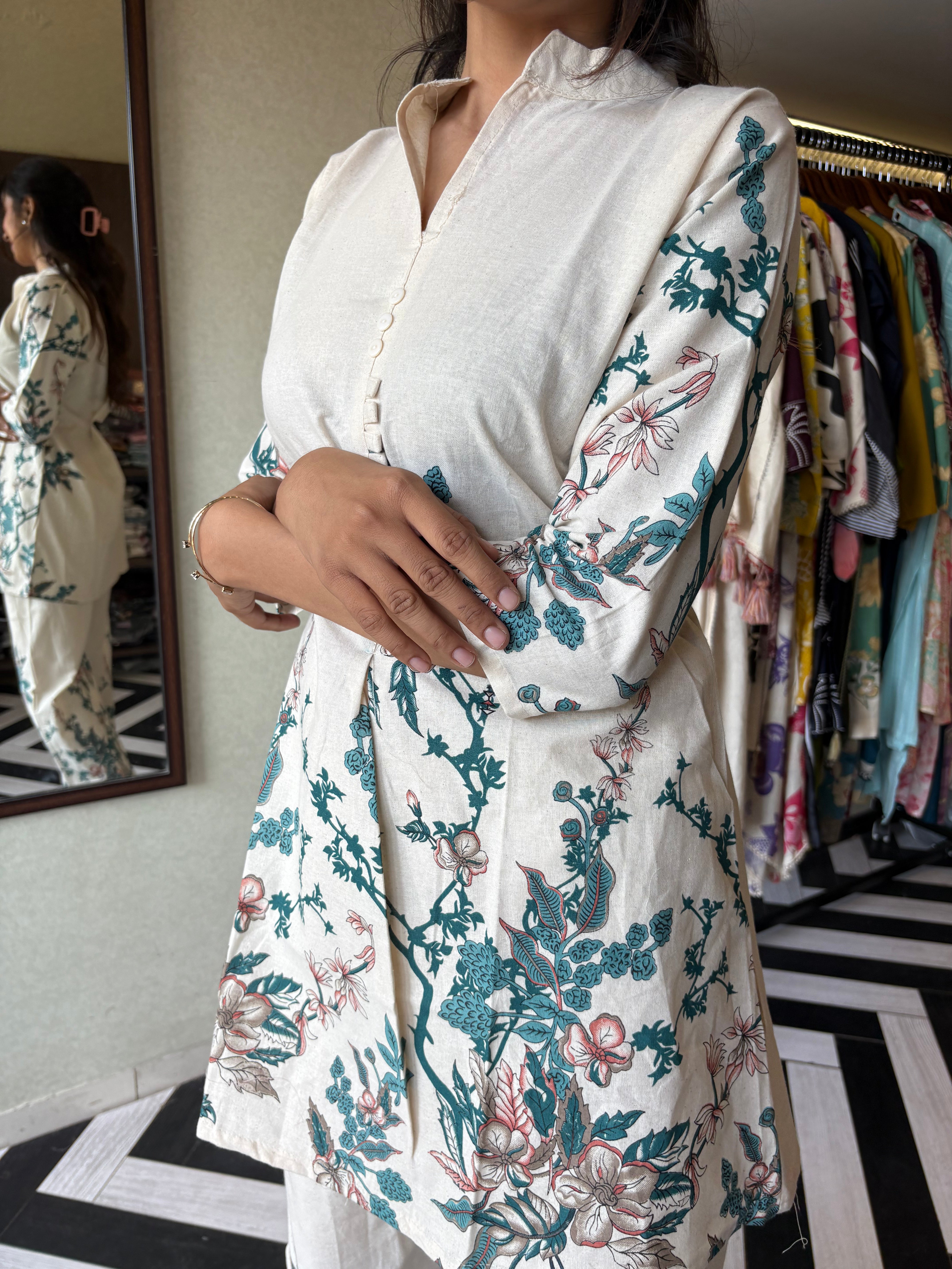 Image of This pure cotton co-ord set in a designer white print is your summer savior - soft on the skin, bold on fashion