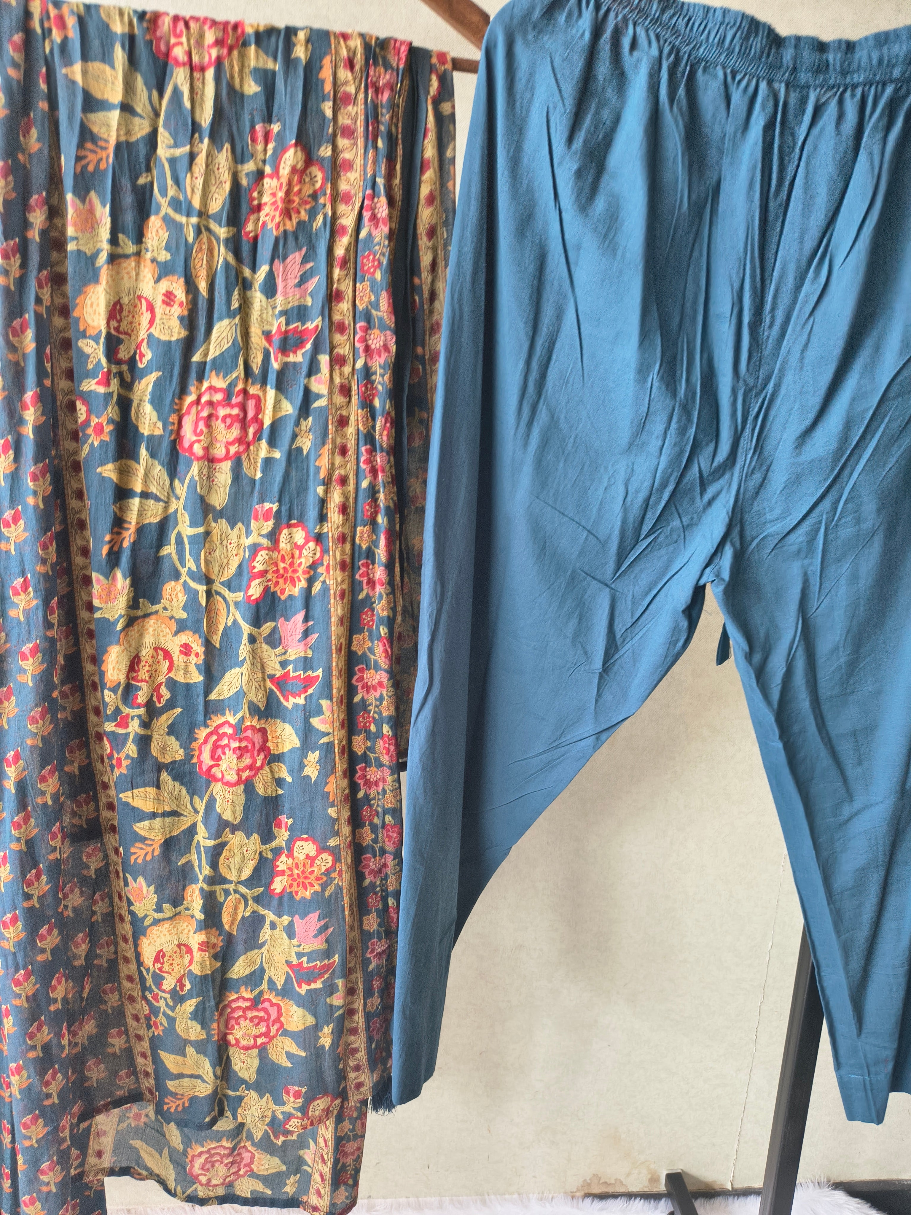 Image of Premium Teal Blue Floral Printed Anarkali Kurta Set with Embroidered V-Neck, Solid Pants & Designer Printed Dupatta