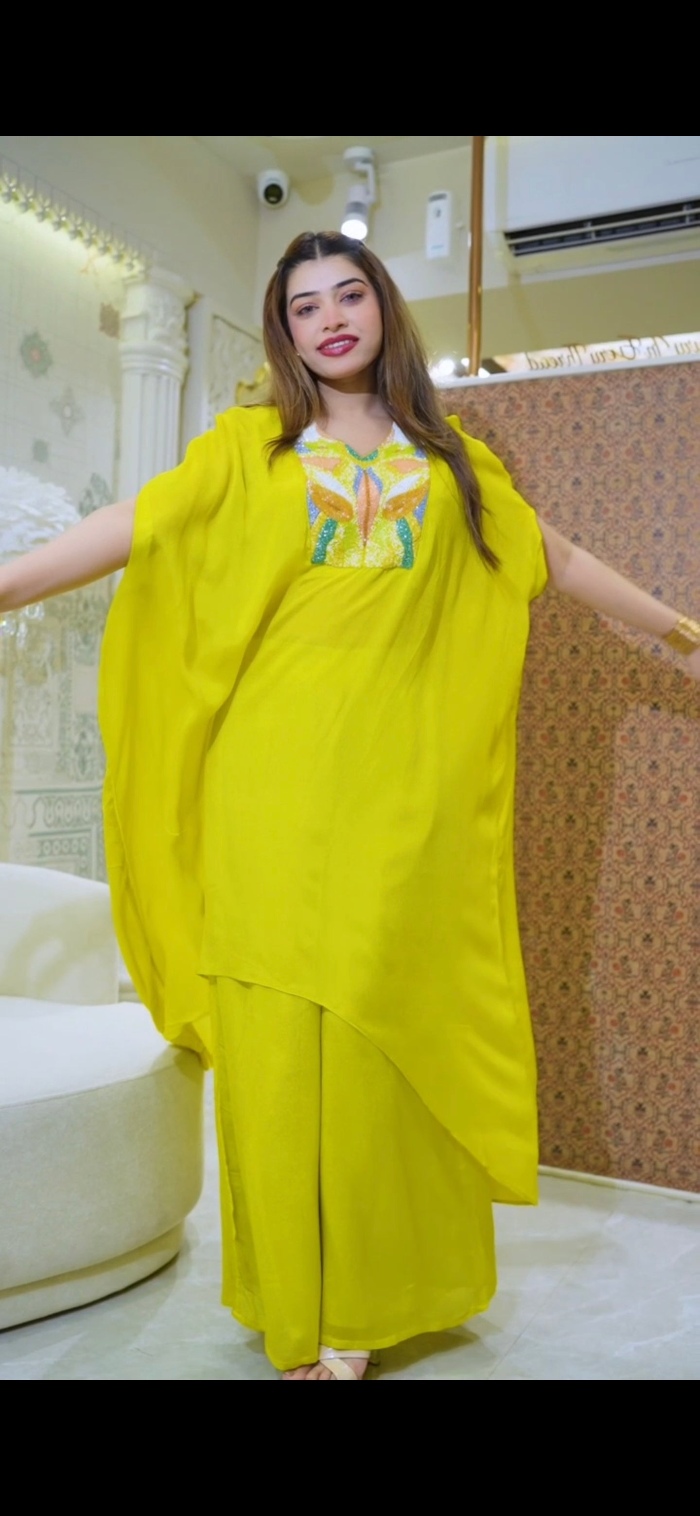 Image of Glow in this stunning pure fabric 2-piece Indo-Western set in radiant yellow & Long Kaftan-style Top with detailed center handwork