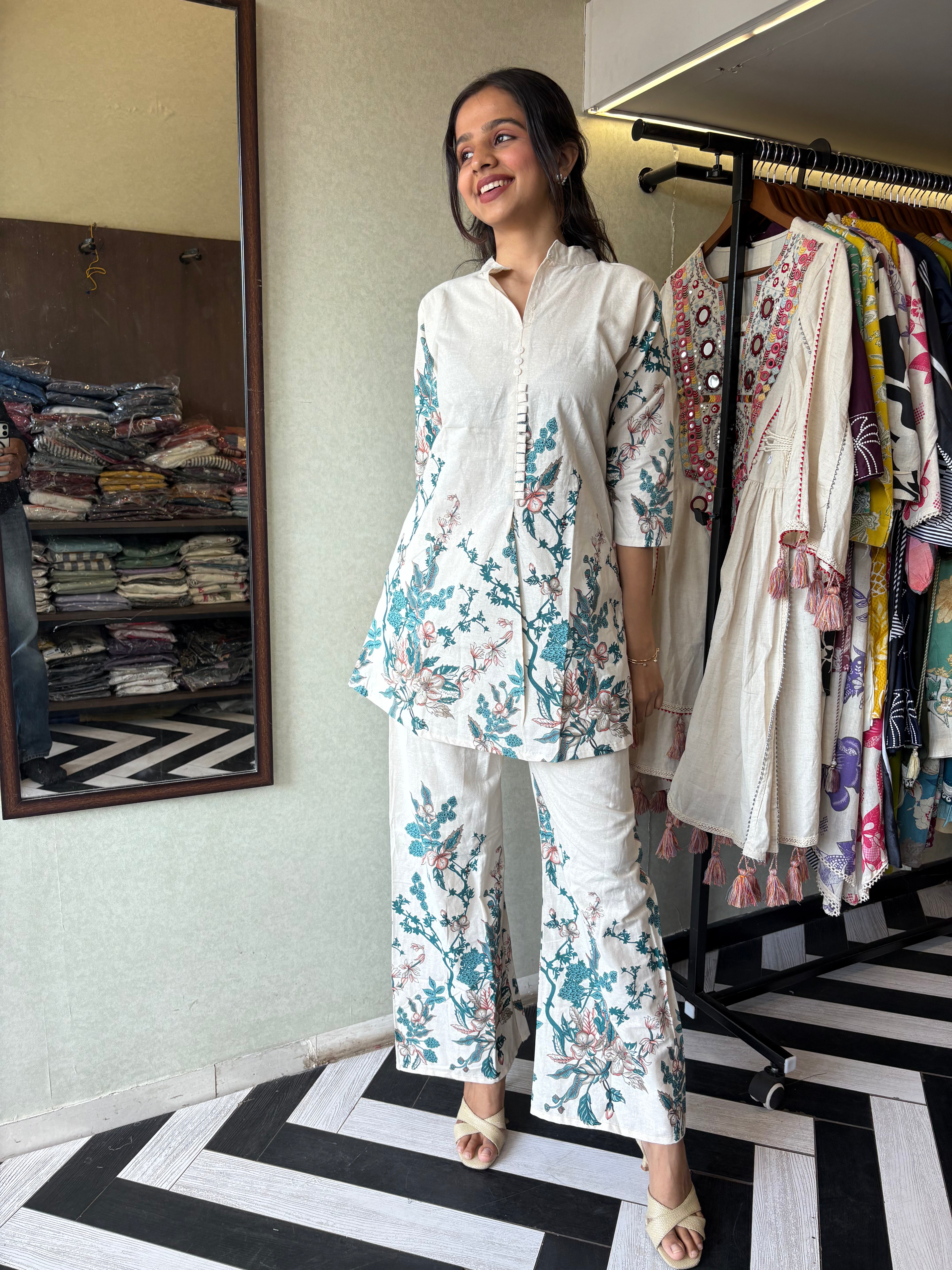 Image of This pure cotton co-ord set in a designer white print is your summer savior - soft on the skin, bold on fashion