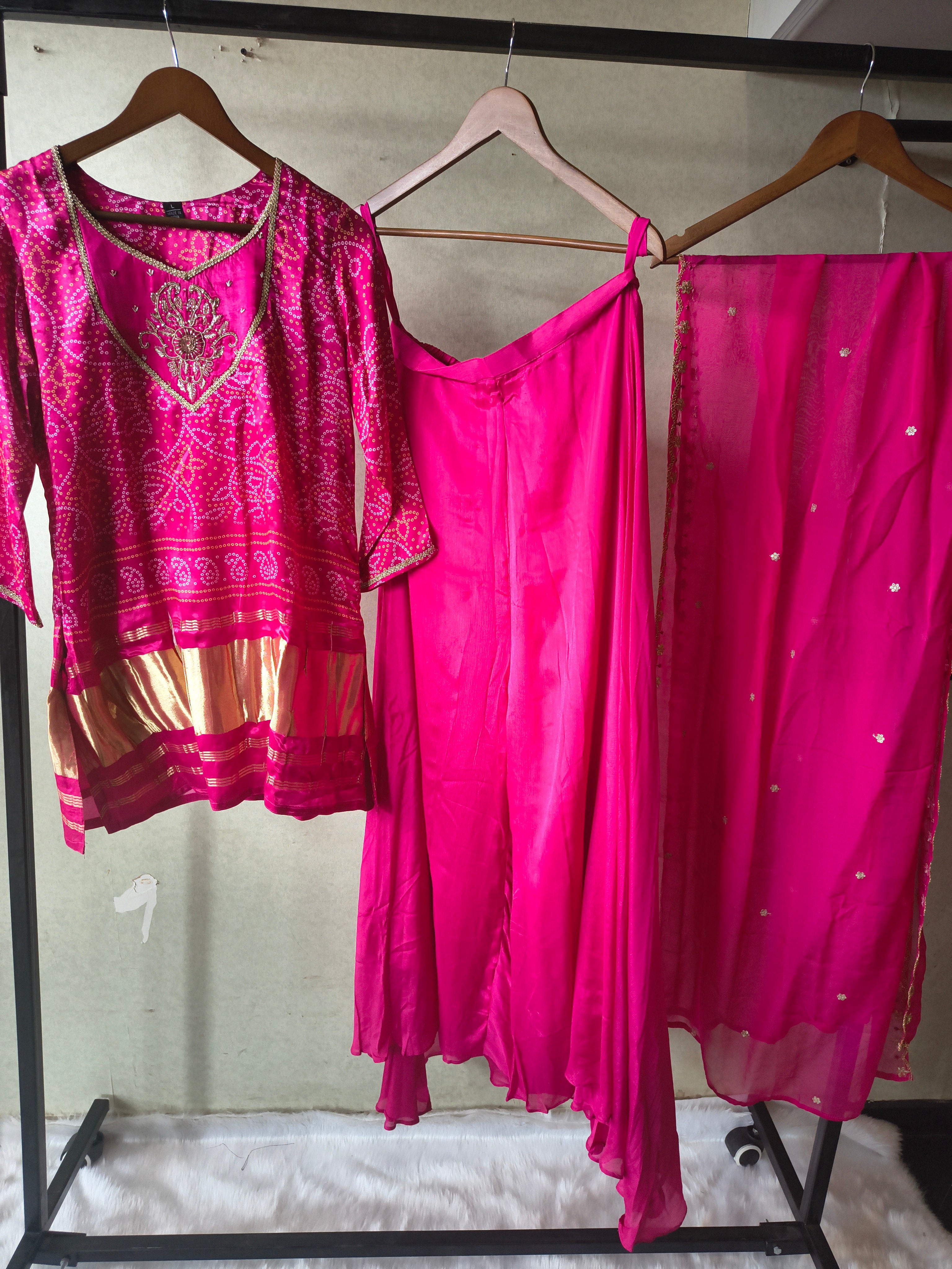 Image of Rani Pink Bandhani Sharara Set with Zari Border & Embroidered Dupatta – Premium 3 Piece Festive Ensemble