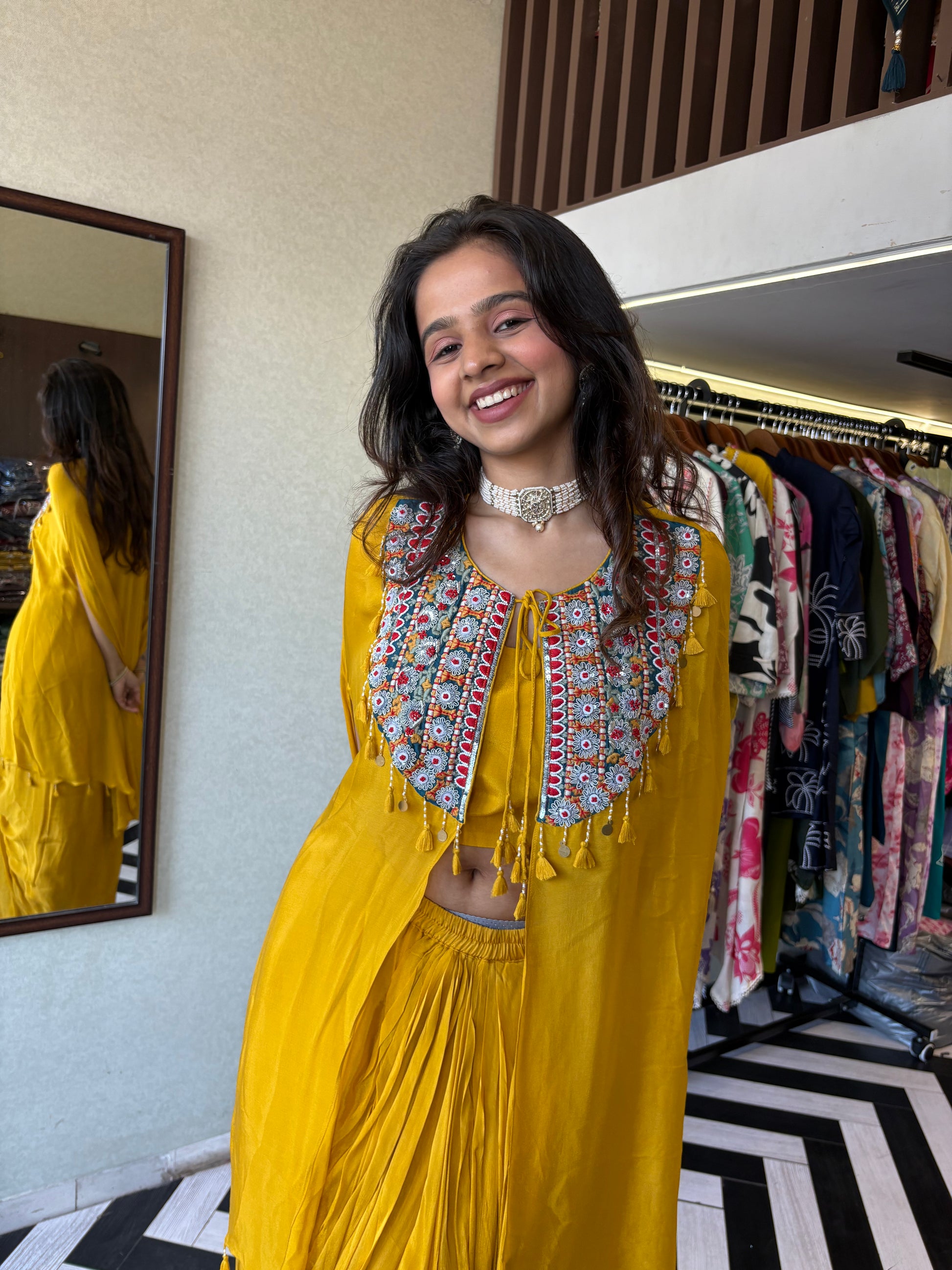 Step into the spotlight with our stunning yellow pure georgette Indo-Western 2-piece. Designed with intricate handwork and full sequin craftsmanship, this piece delivers pure elegance for those who love to shine bright