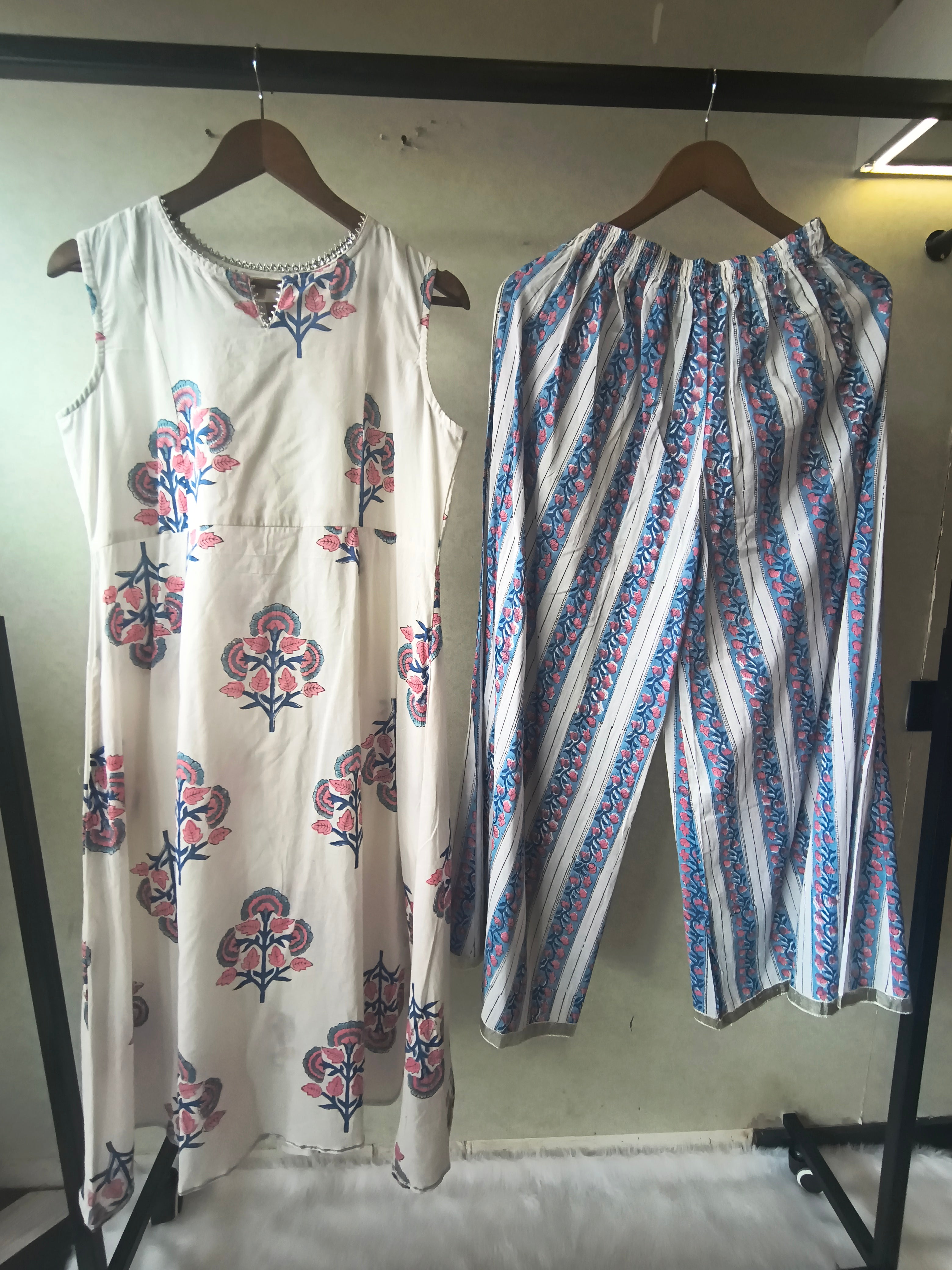 Image of Premium Ivory Floral Block Print Sleeveless Kurta with Printed Palazzo Pants Co-Ord Set