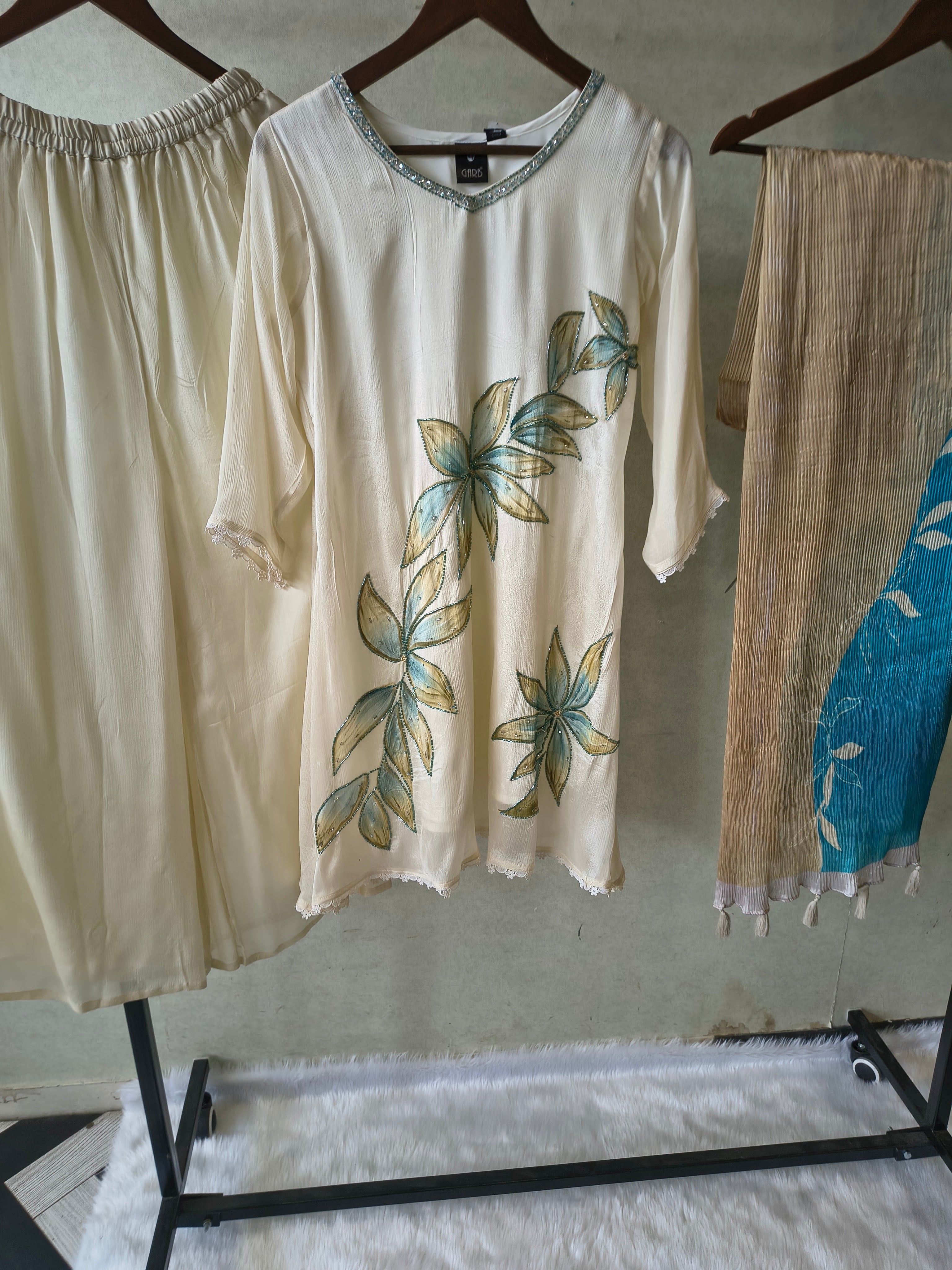 Image of Ivory Floral Hand-Painted Three-Piece Kurta Set with Palazzo & Ombre Dupatta