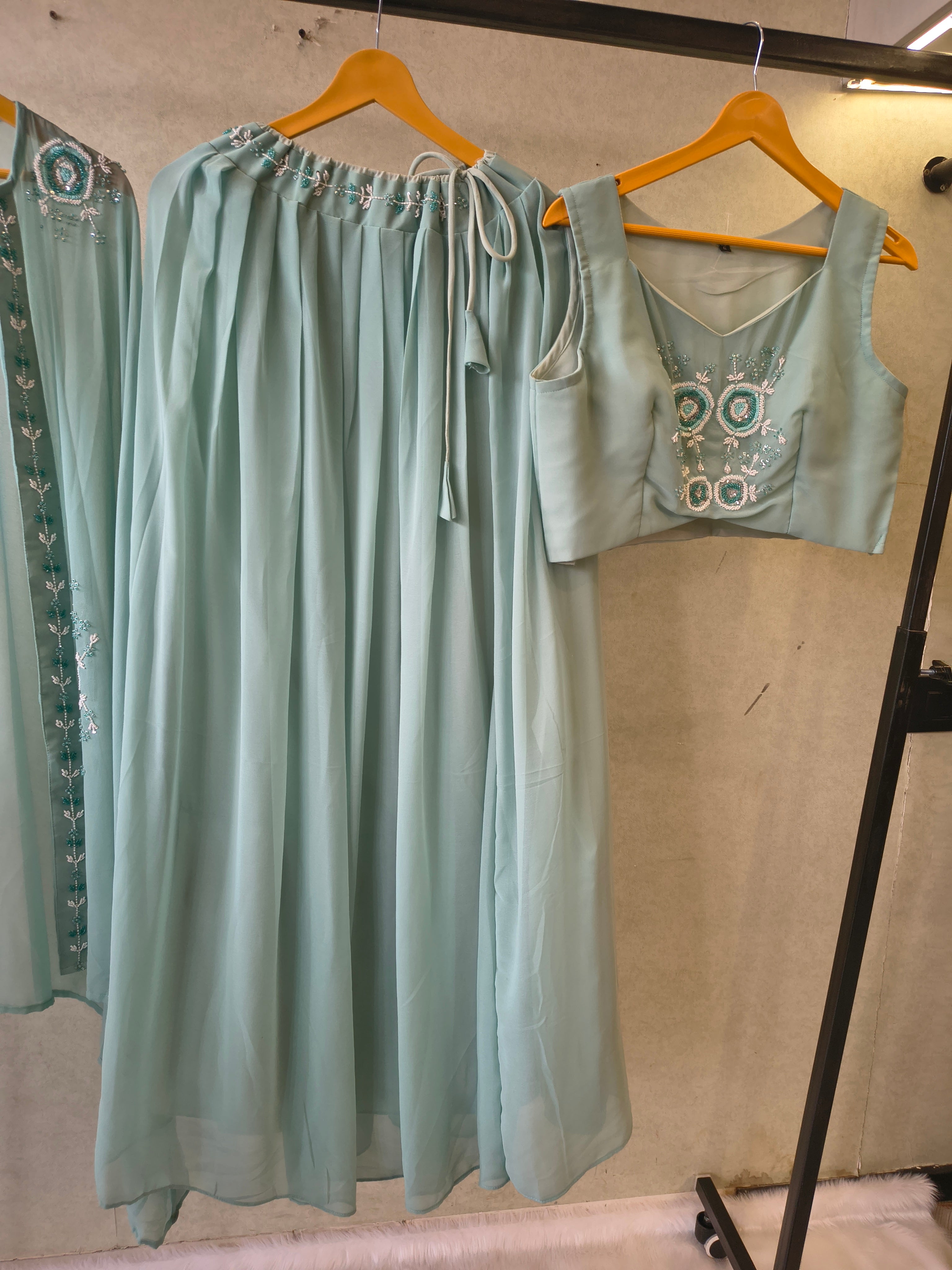 Image of Powder Blue Designer Crop Top Sharara Set with Embroidered Cape & Flared Palazzo | Premium 3 Piece Occasion Wear