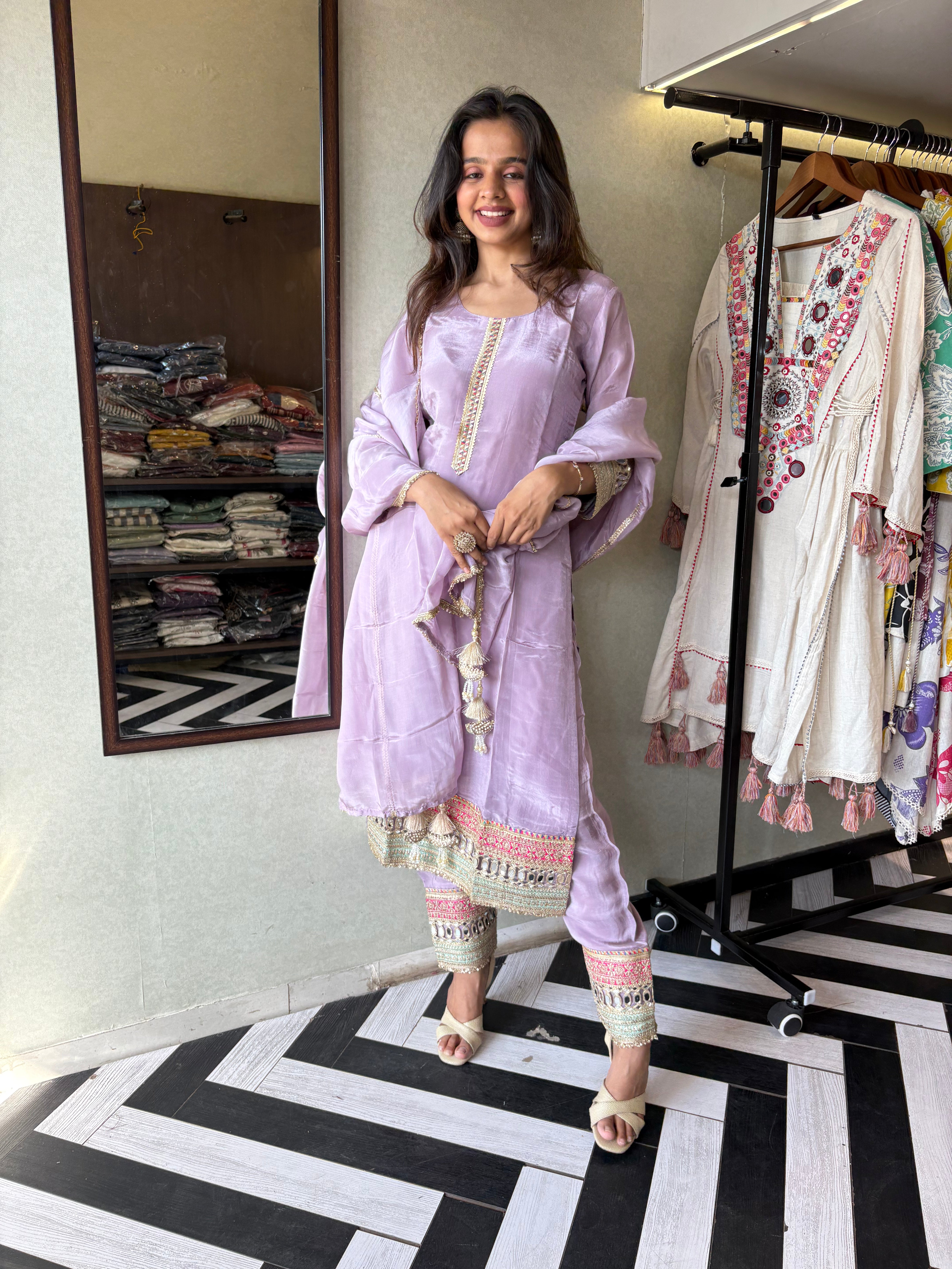 Image of Shine Bright in Royal Magenta!

Crafted in pure silk crepe, this designer straight-cut kurti set is finished with mirror handwork on sleeves and pant ends - a perfect blend of subtle glam and timeless class.