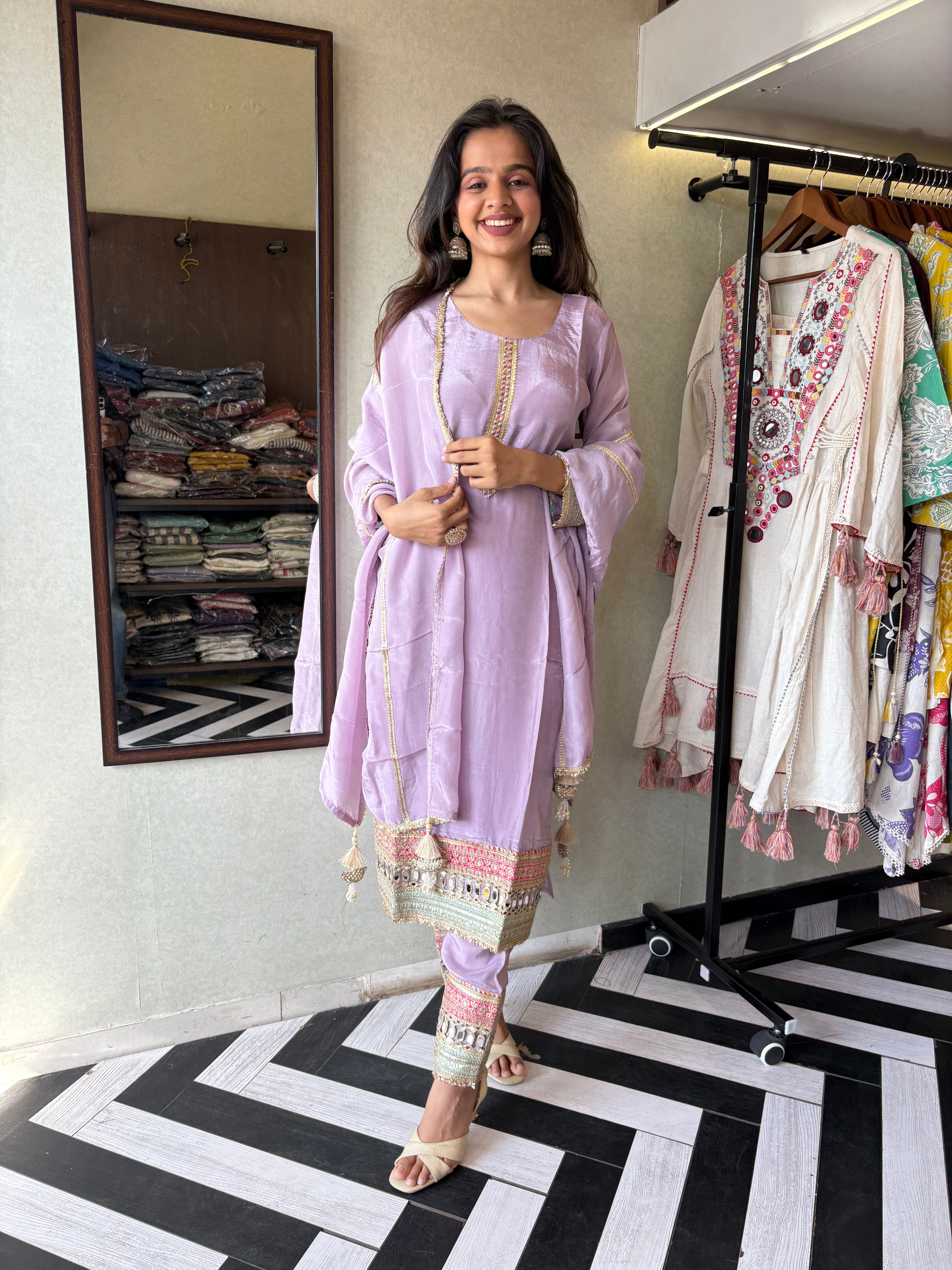 Shine Bright in Royal Magenta!

Crafted in pure silk crepe, this designer straight-cut kurti set is finished with mirror handwork on sleeves and pant ends - a perfect blend of subtle glam and timeless class.