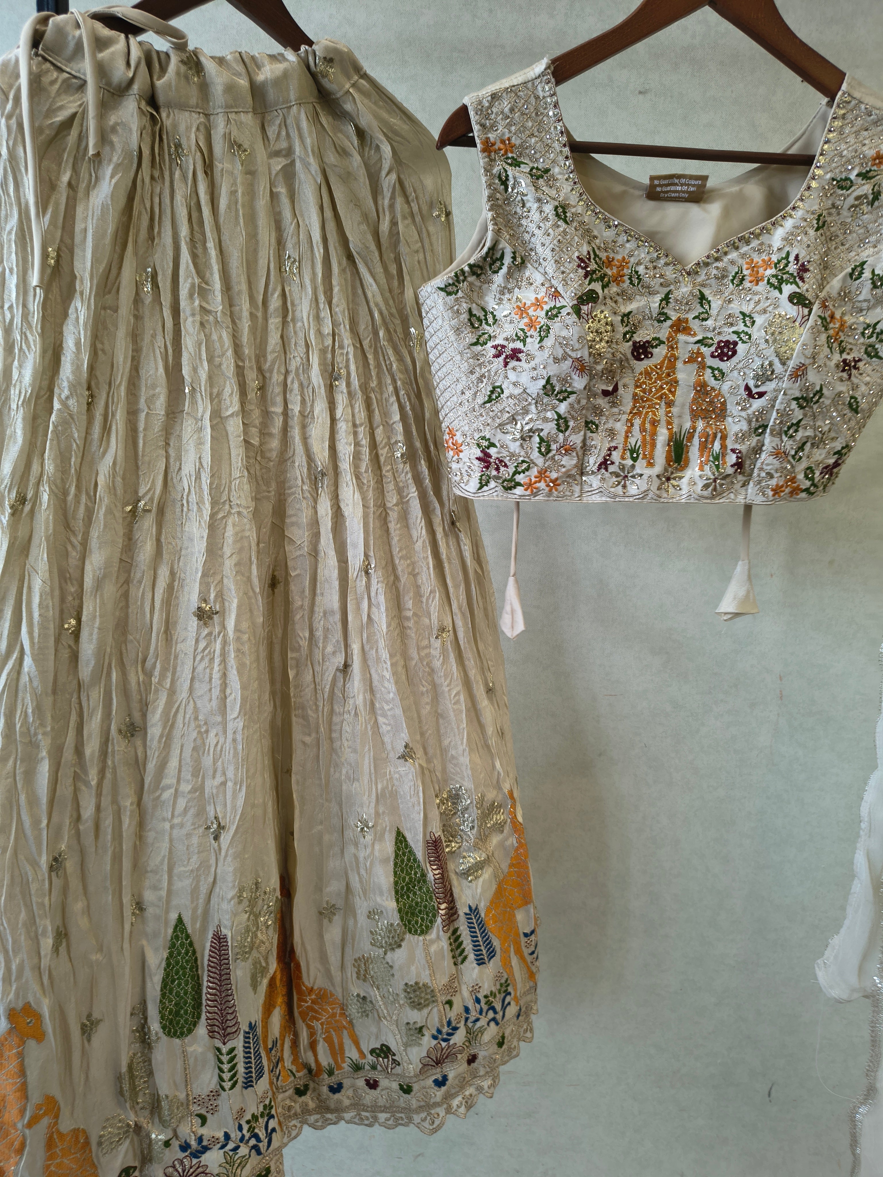 Image of Ivory Grey Hand-Embroidered Designer Lehenga Set with Statement Blouse & Soft Organza Dupatta | Premium Wedding Collection