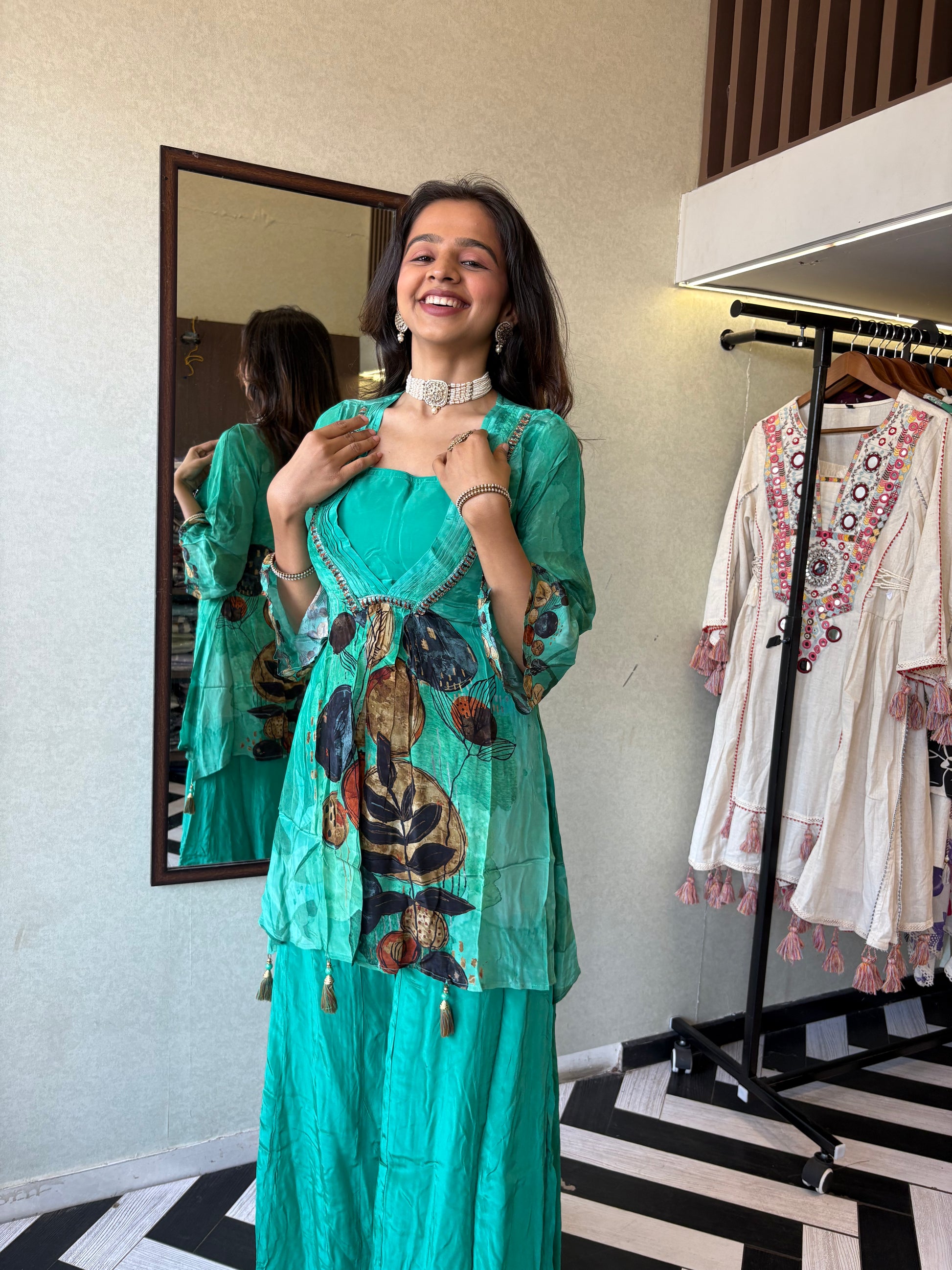 Step into the celebration with our Designer Crepe 2-Piece Set in a refreshing green hue, crafted with intricate detailing and effortless grace