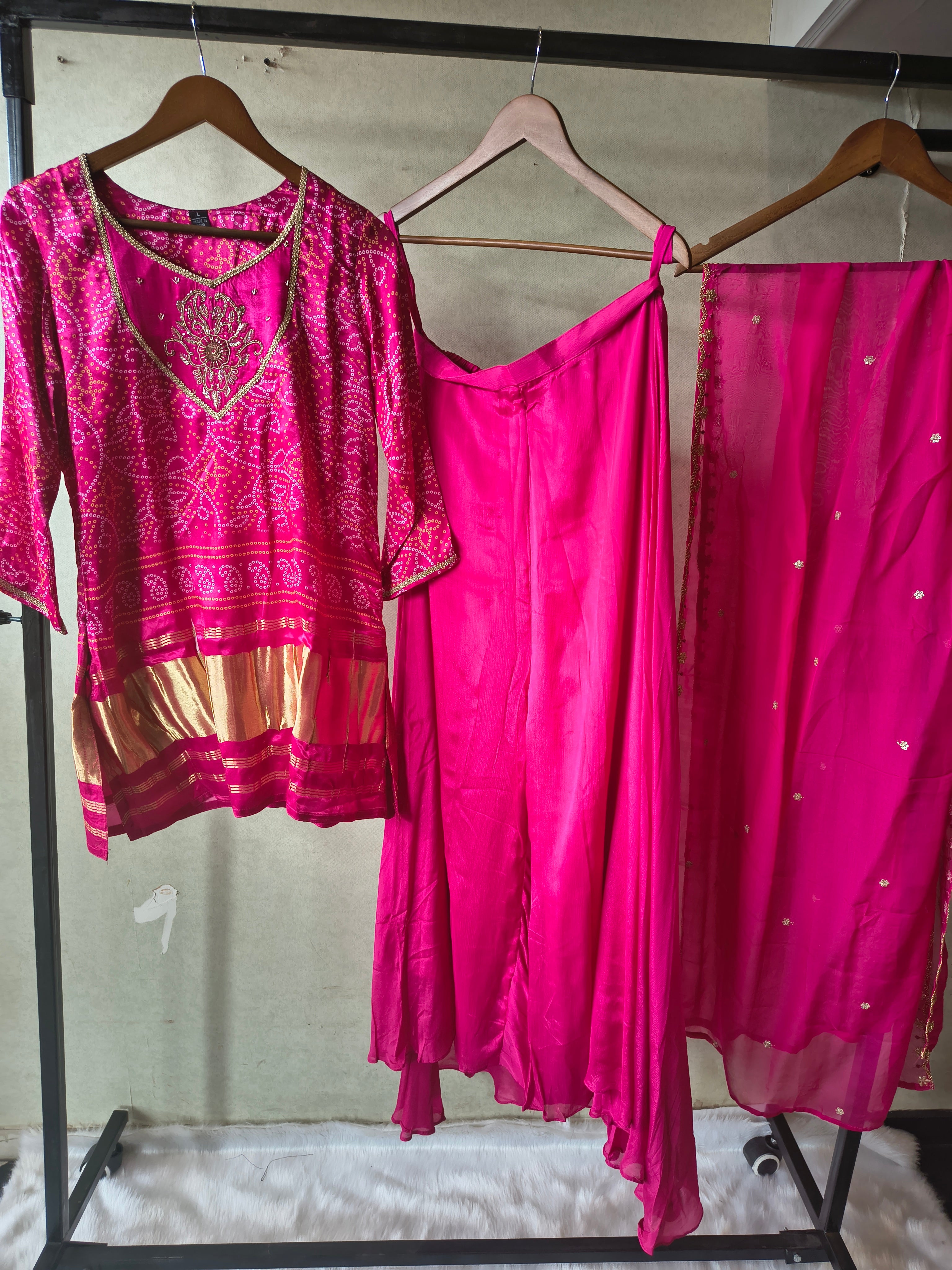 Image of Rani Pink Bandhani Sharara Set with Zari Border & Embroidered Dupatta – Premium 3 Piece Festive Ensemble