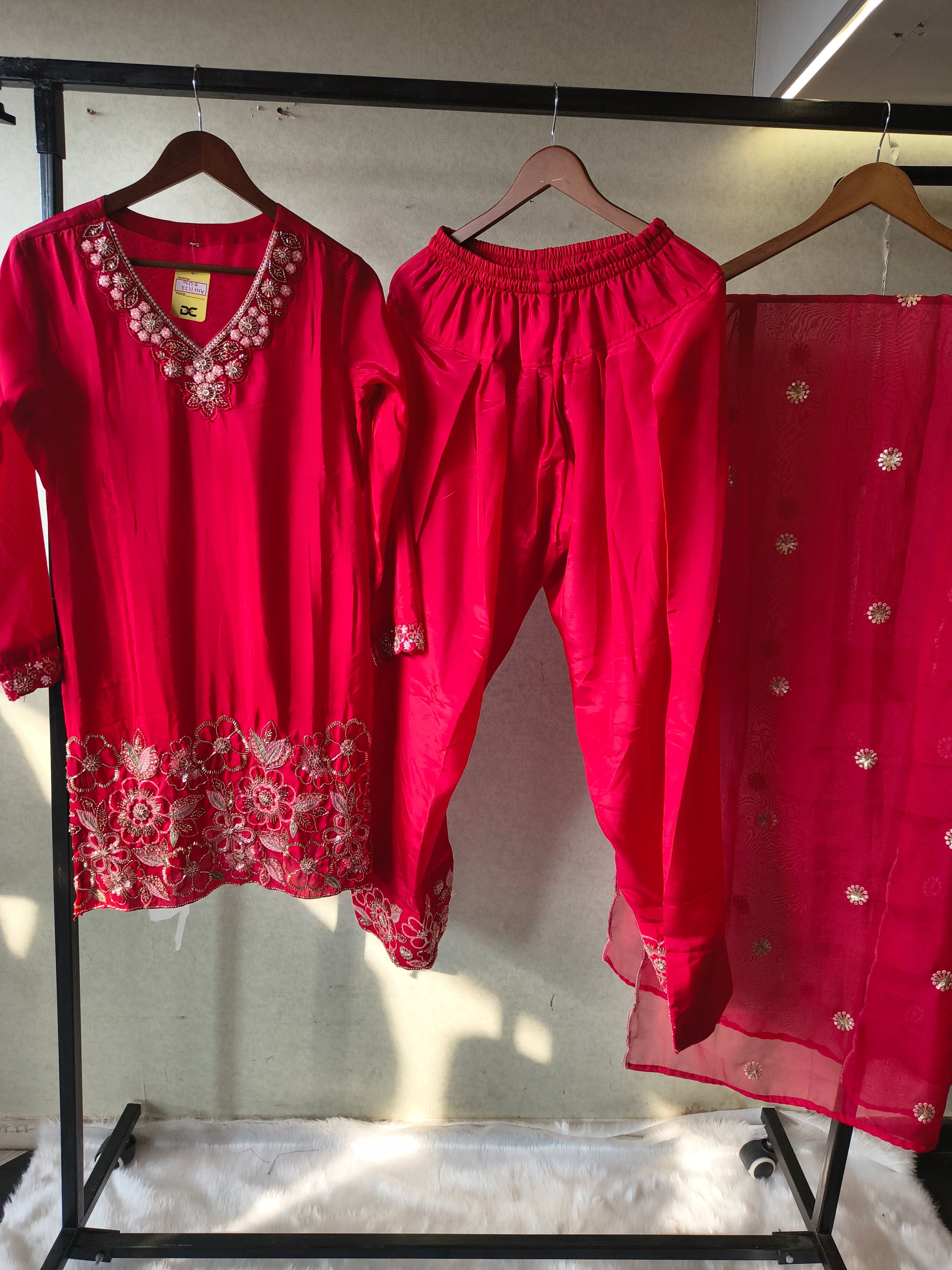 Image of Ruby Red Embroidered Straight Kurta Set with Floral Thread Work, Designer Neckline & Embellished Dupatta – Premium 3 Piece Ethnic Ensemble