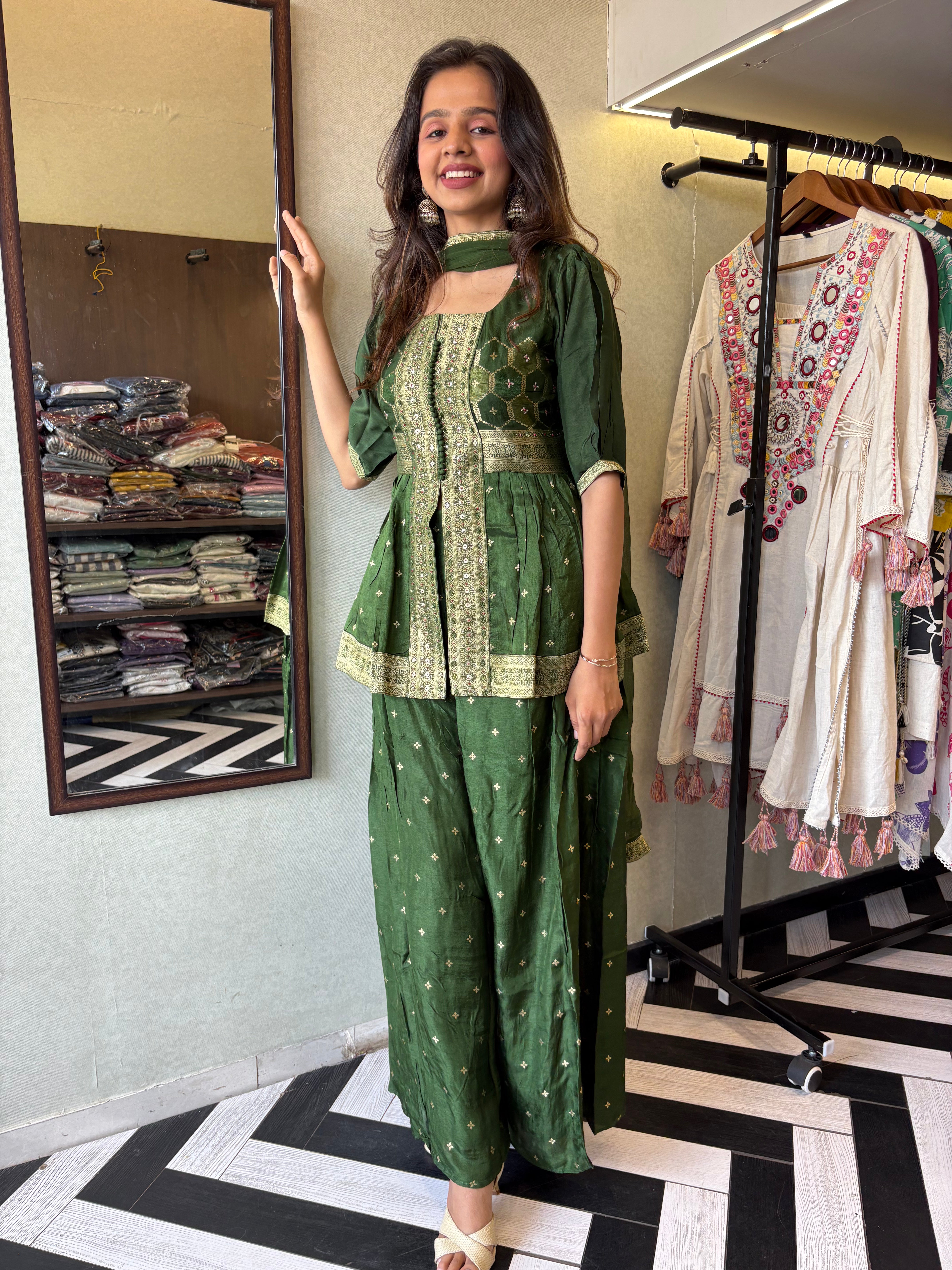 our premium pure silk 3-piece Indo-Western set in stunning green! From dazzling mirror & handwork on the jacket-style top to the flowing plazzo and dupatta