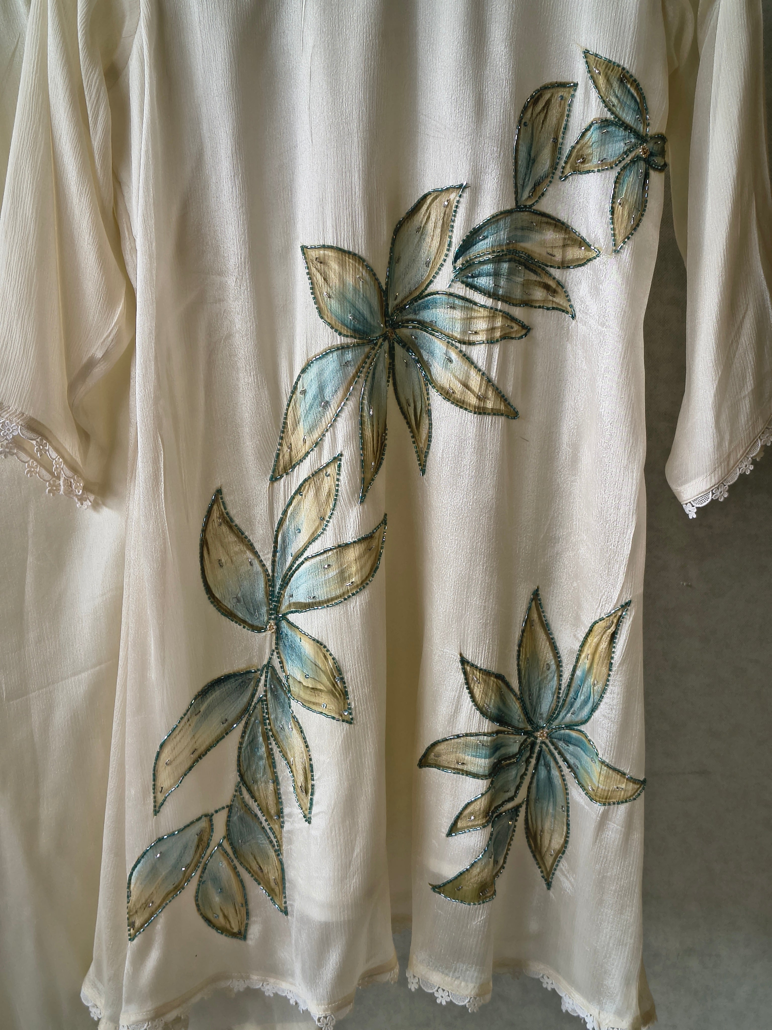 Image of Ivory Floral Hand-Painted Three-Piece Kurta Set with Palazzo & Ombre Dupatta