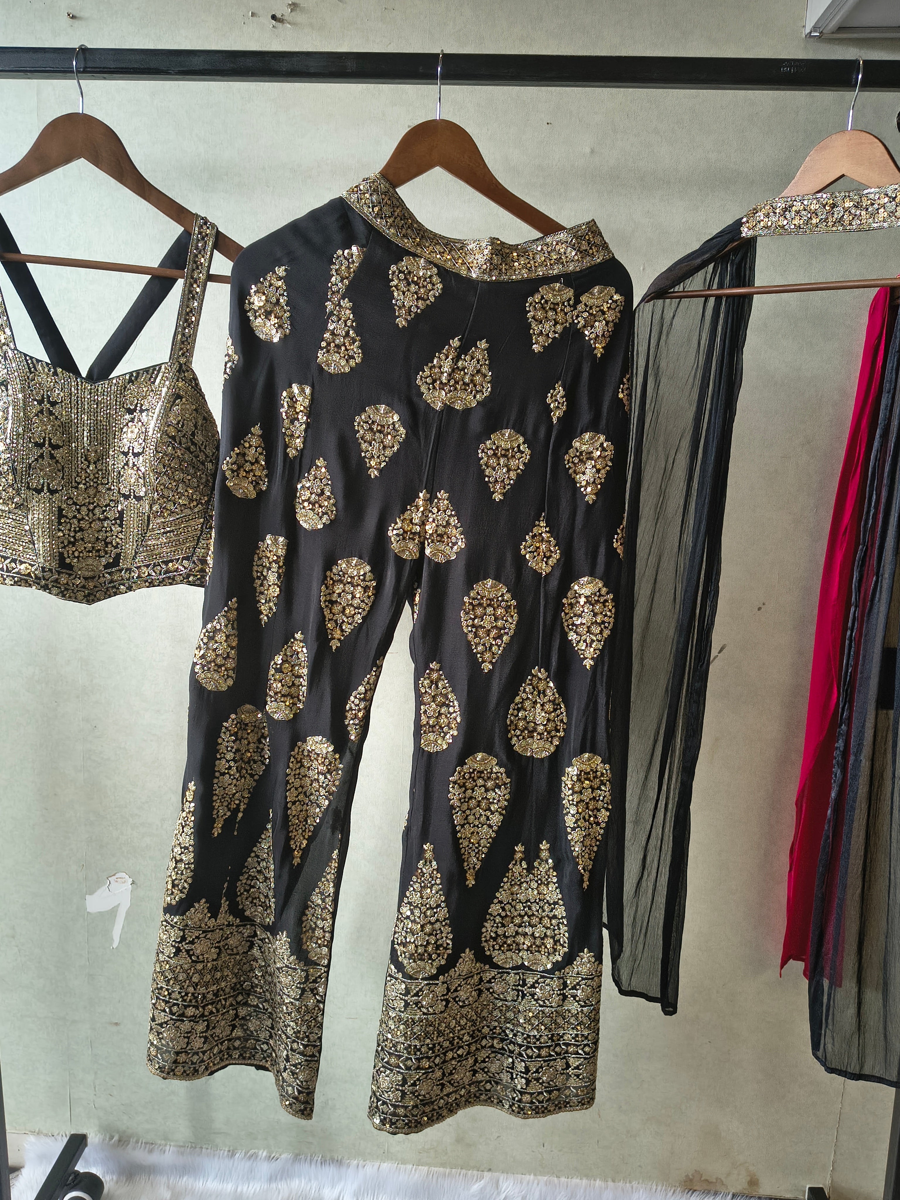 Image of Luxury Black Hand-Embroidered Bustier & Palazzo Set with Embellished Net Dupatta – 3 Piece Designer Ensemble