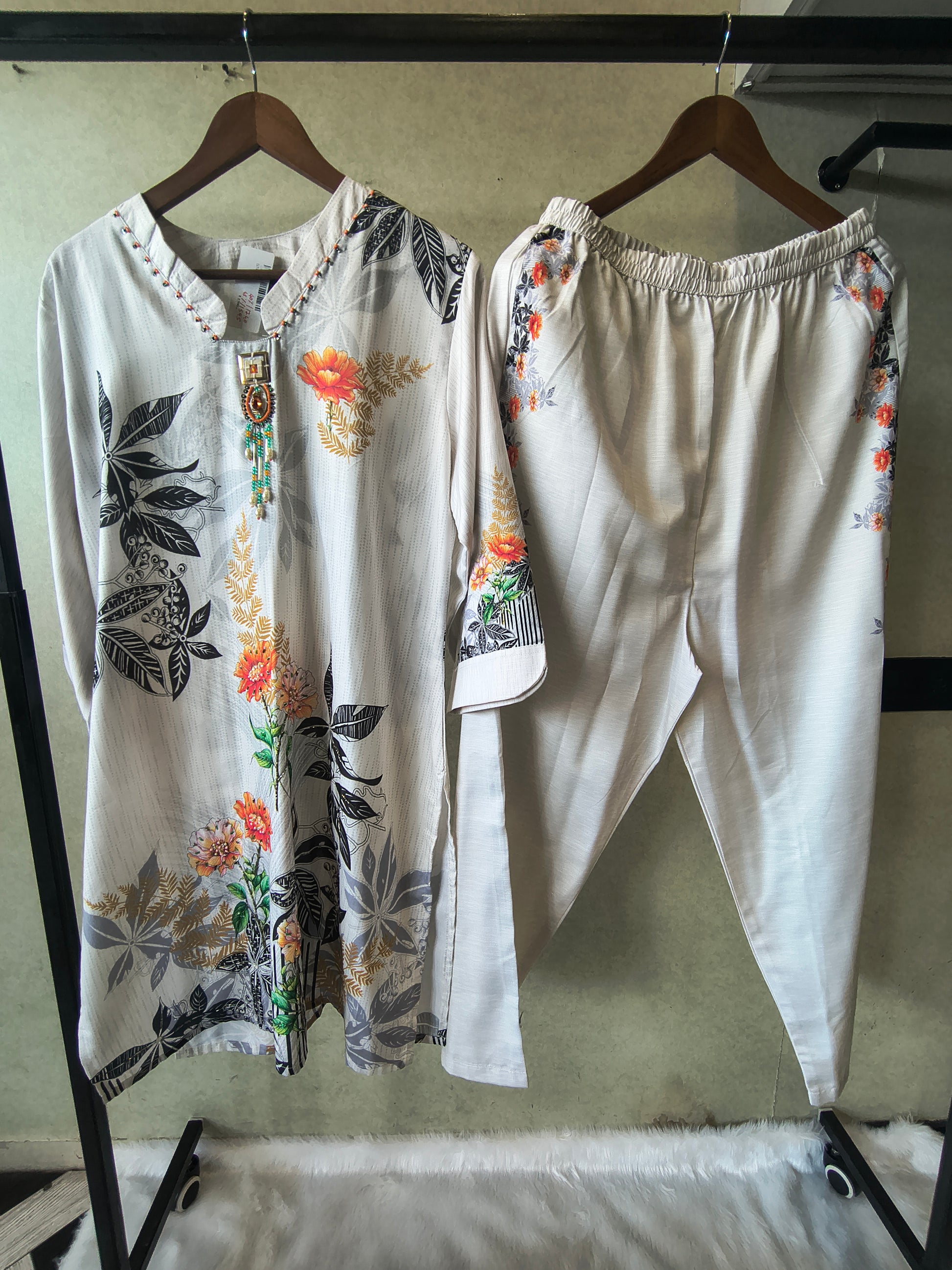 Premium Ivory Botanical Printed Kurta Set with Designer Pendant Neckline